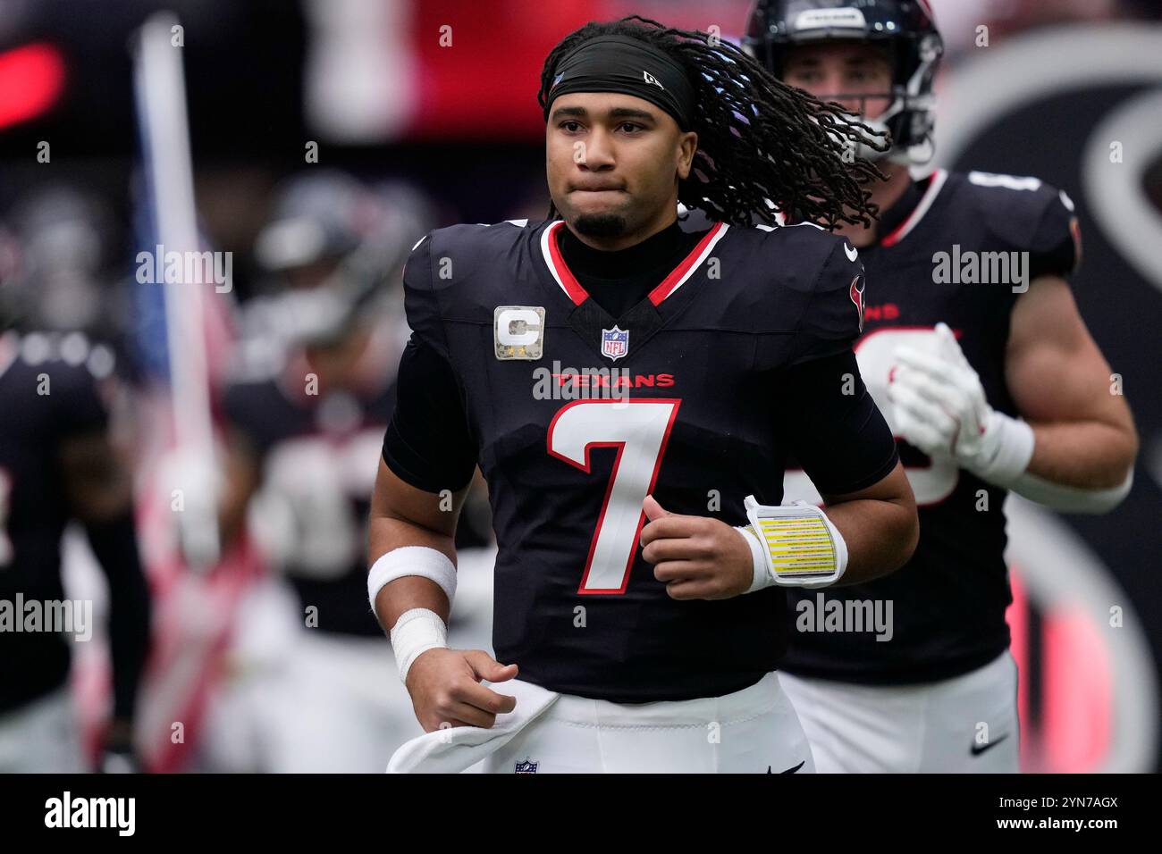 Texas Texans NFL football quarterback Matt Schaub and his wife Laurie visit  with 2-month-old chemotherapy patient Olivia Esparza and her father Eduardo  in the Child Life Room at the Texas Children's Hospital, image size:1300x956