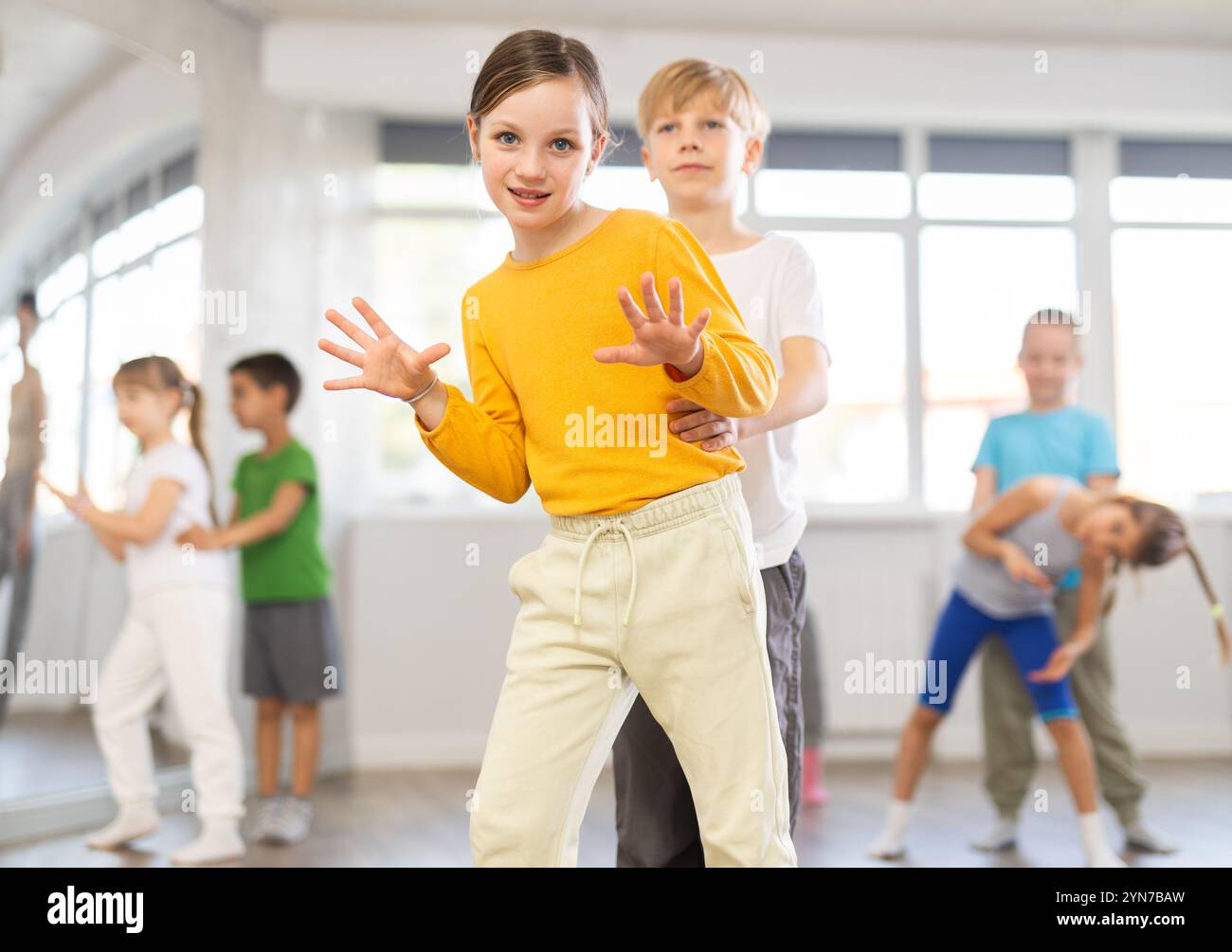 Girl paired up with boy and training to perform boogie woogie couple ...