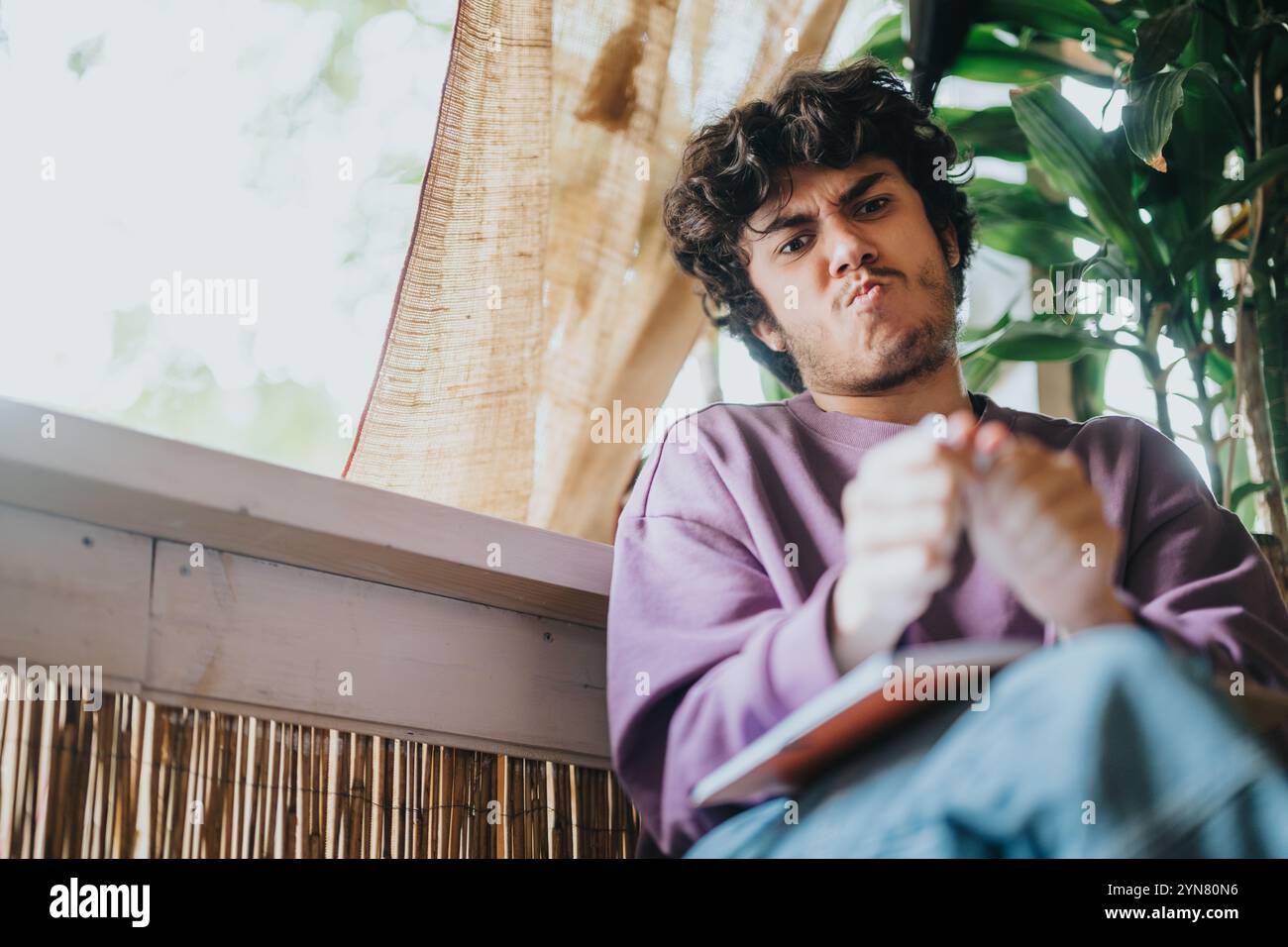 Man ripping paper hi-res stock photography and images - Alamy