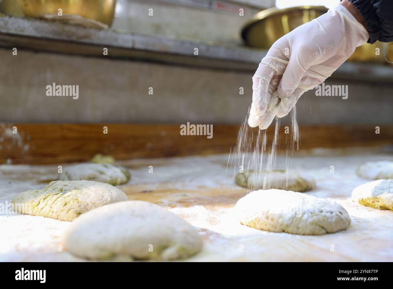 Adding flour base dough in hi-res stock photography and images - Alamy