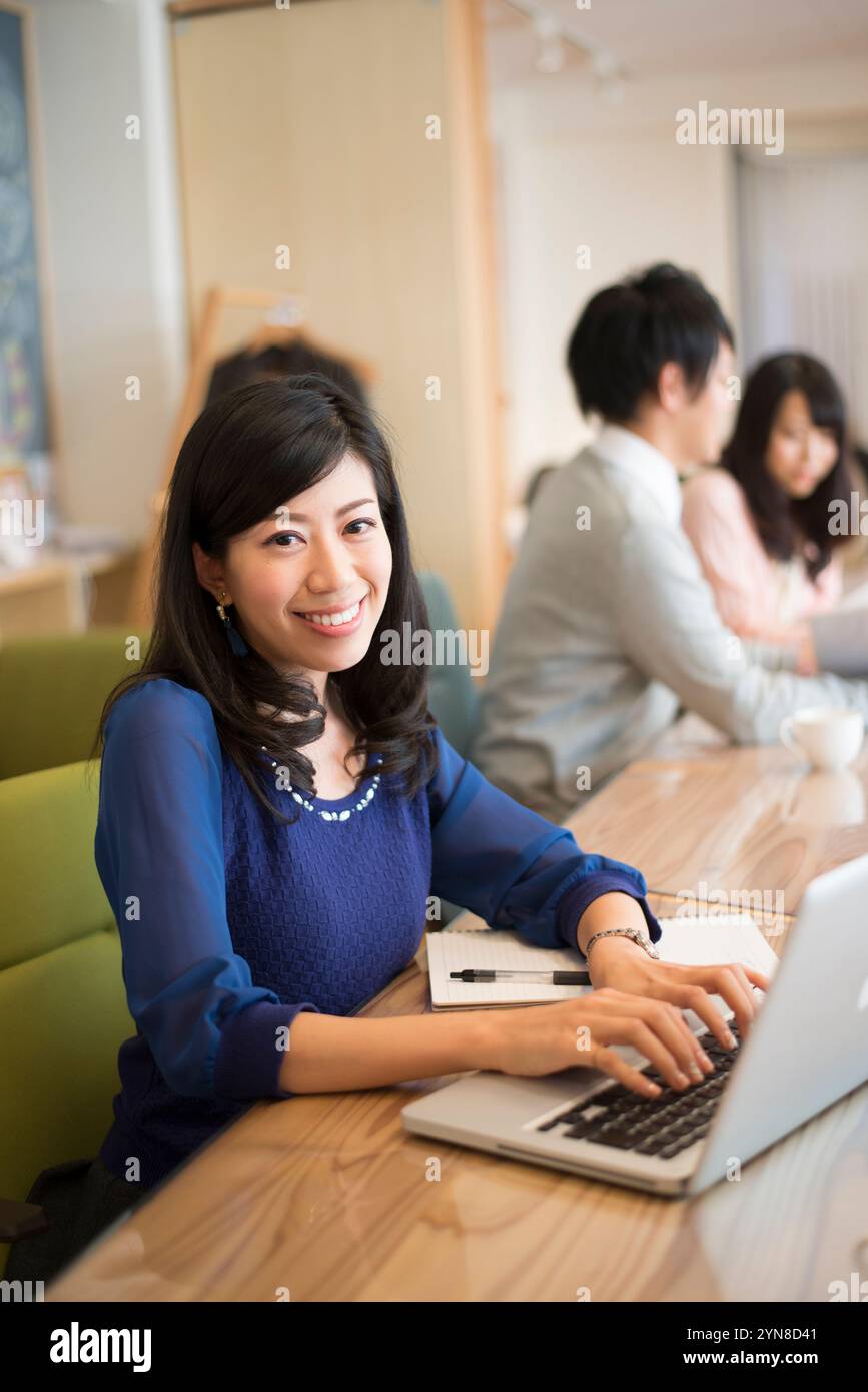 Japanese man woman working hi-res stock photography and images - Alamy