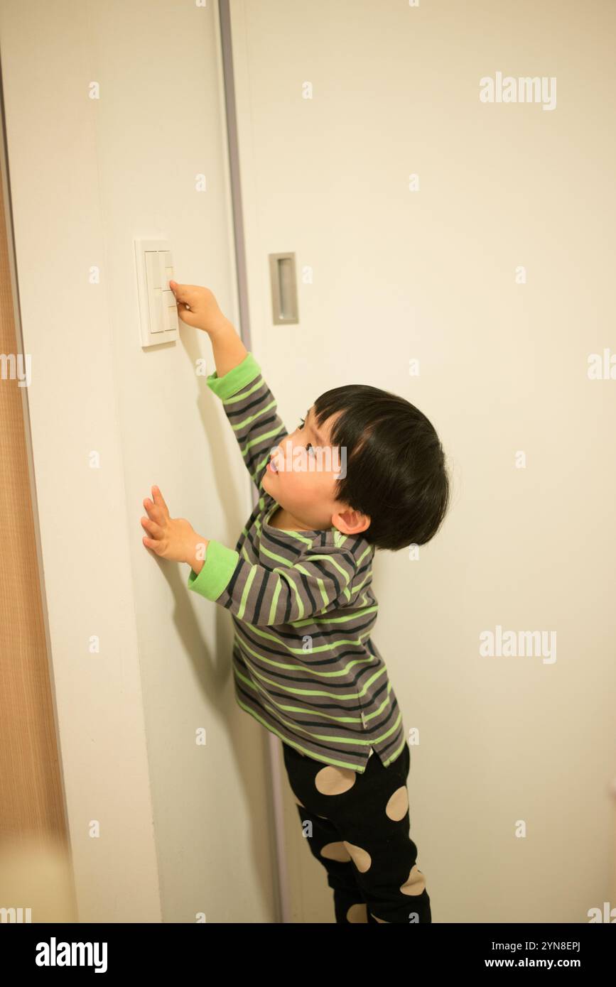 Boy switch hi-res stock photography and images - Alamy