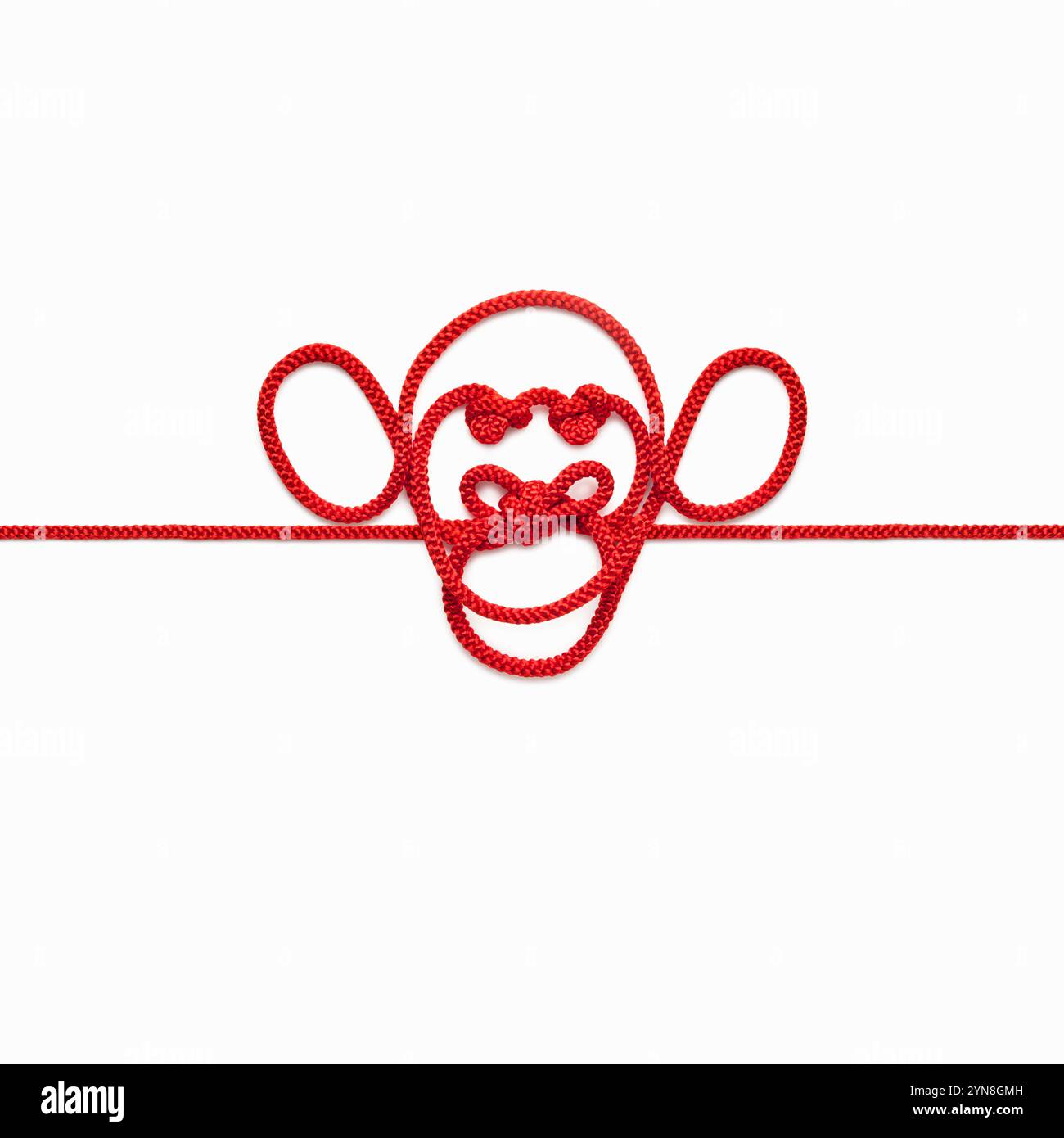 Image of a face made with red string Stock Photo - Alamy