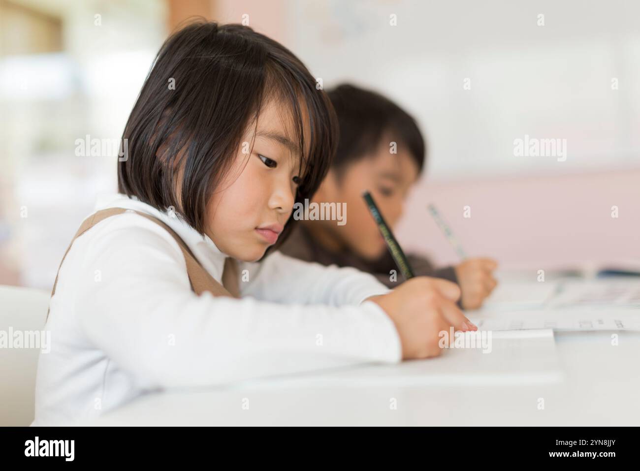 Children studying in the classroom Stock Photo - Alamy