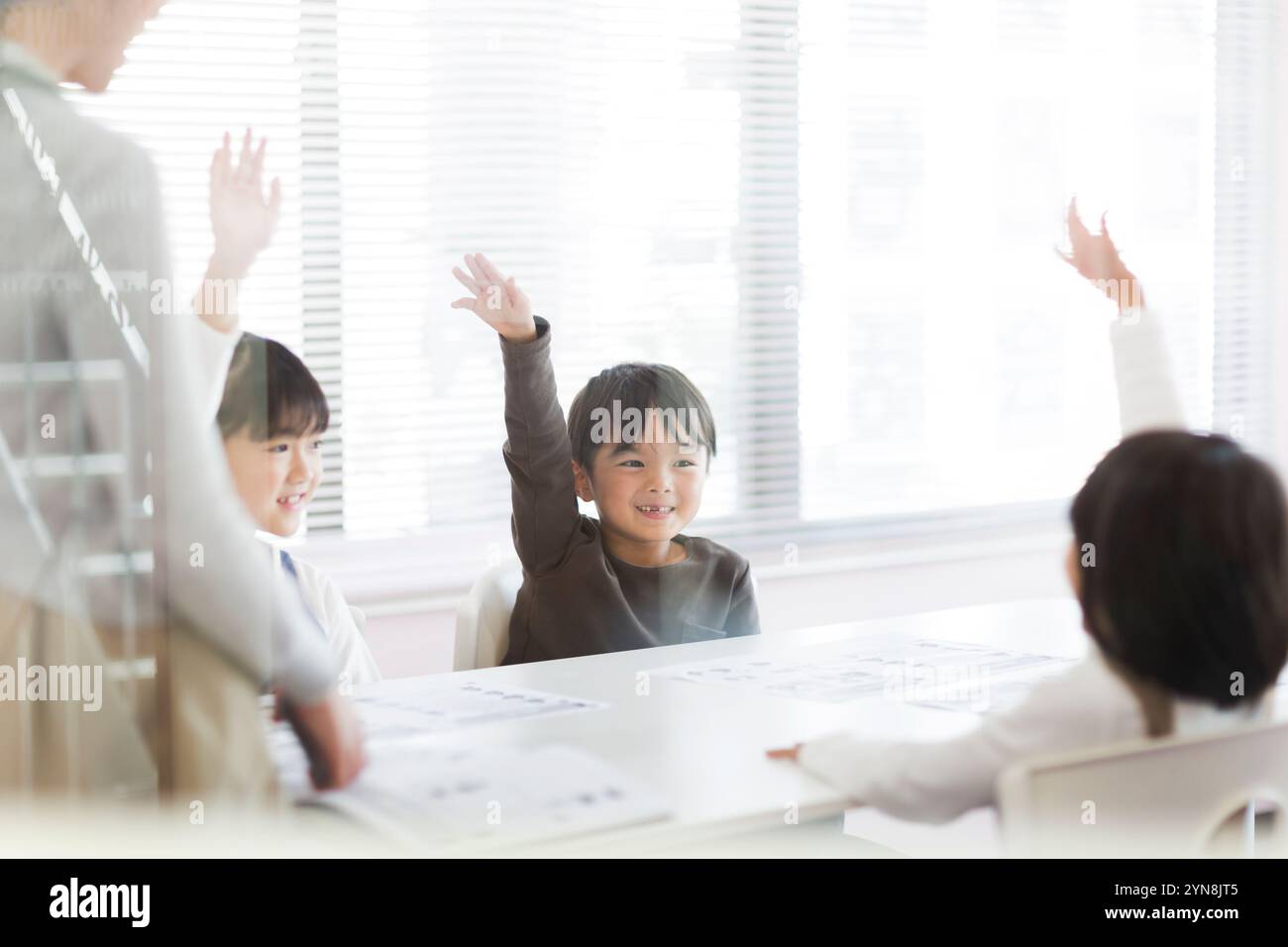 Children taking a class in a classroom Stock Photo