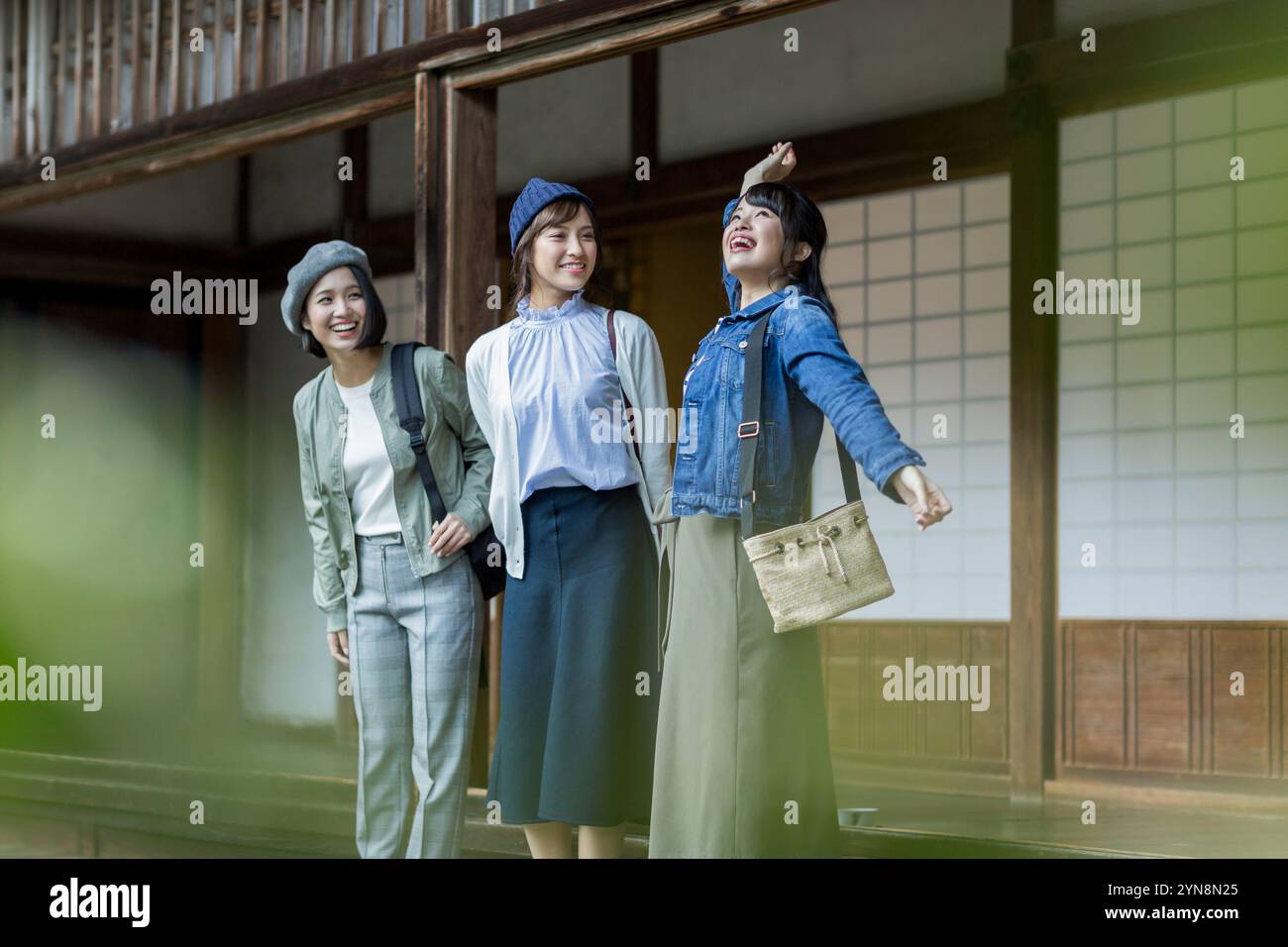 Three women standing on hi-res stock photography and images - Alamy