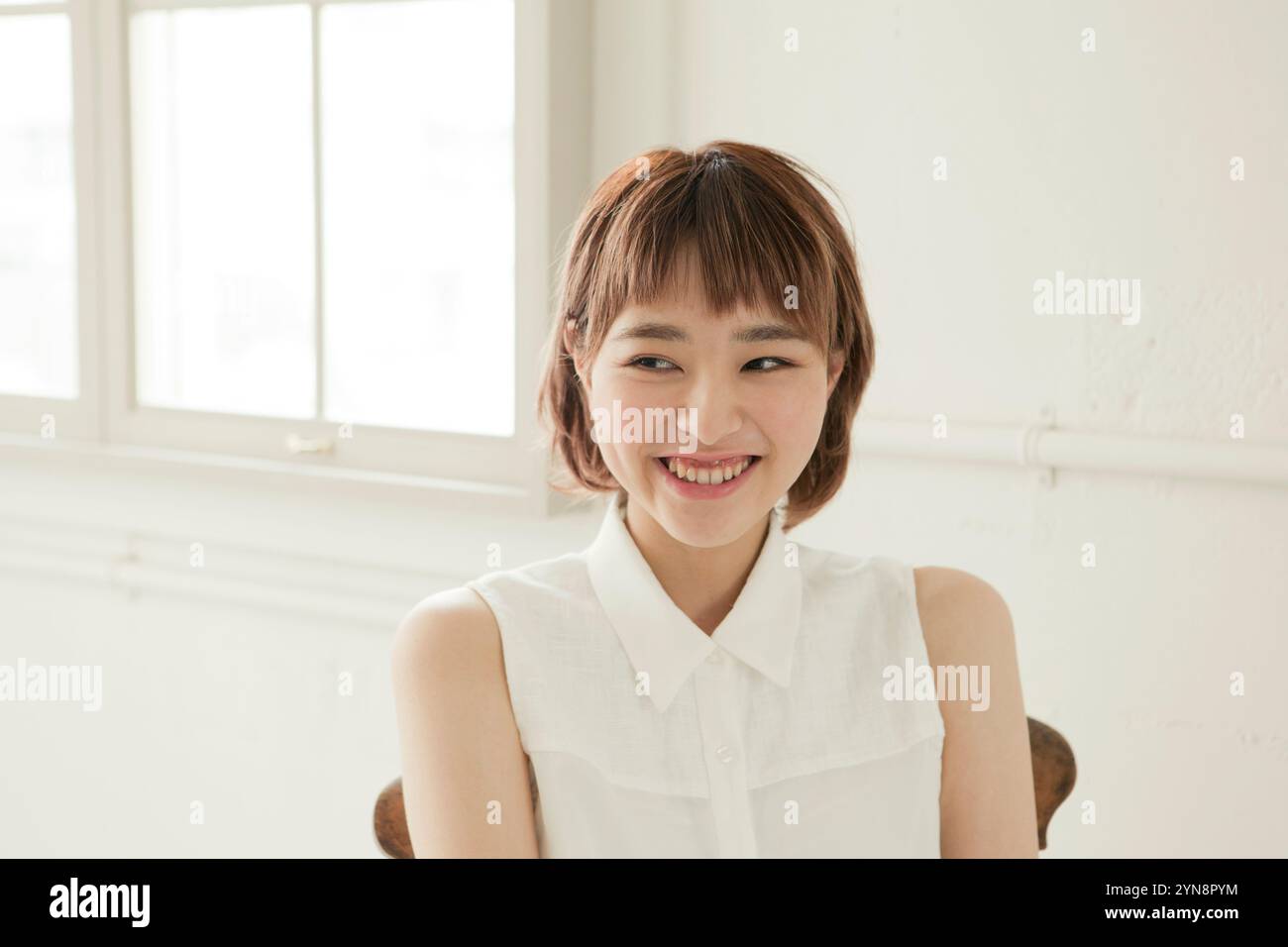 Woman in her 20s with a nice smile Stock Photo