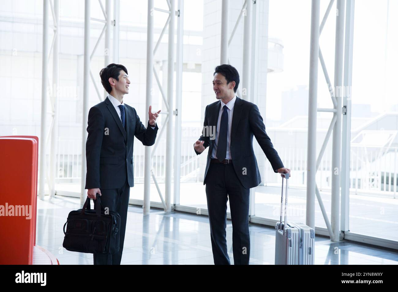 Black men suits talking hi-res stock photography and images - Alamy