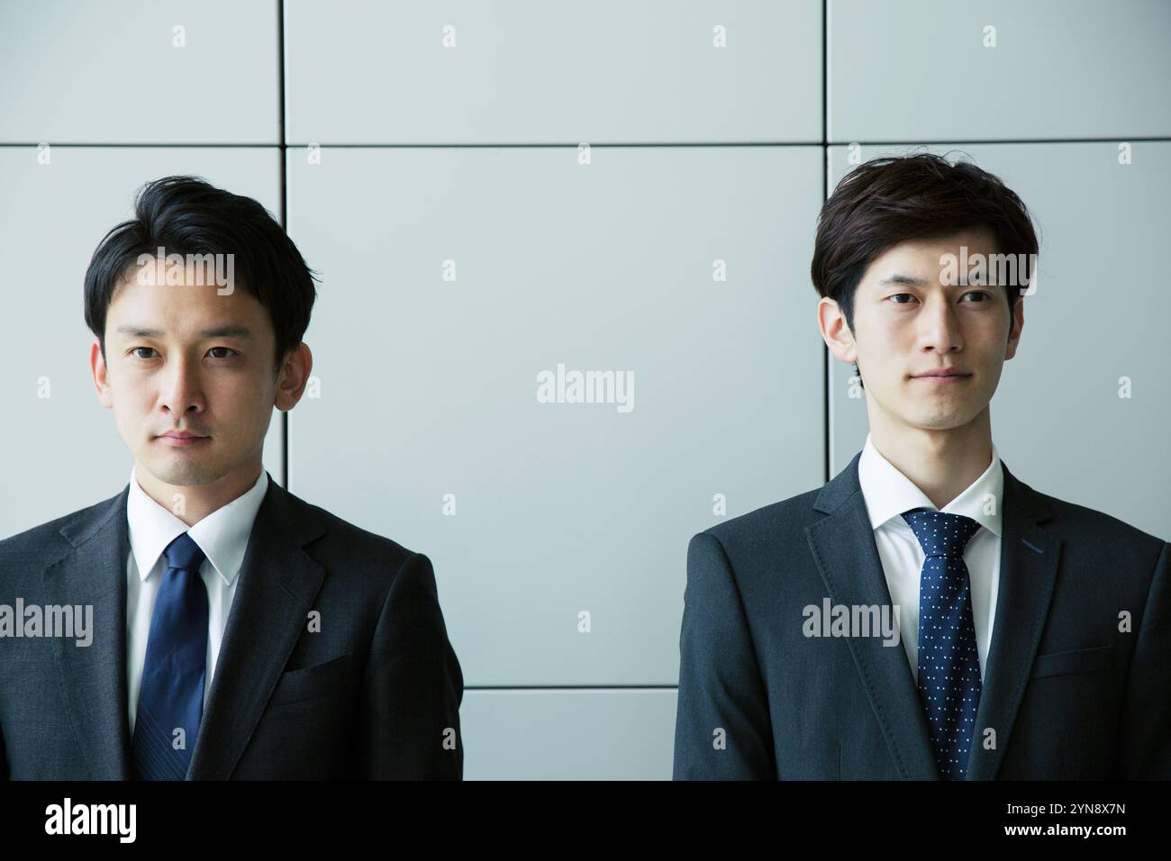 Business men black suits hi-res stock photography and images - Alamy