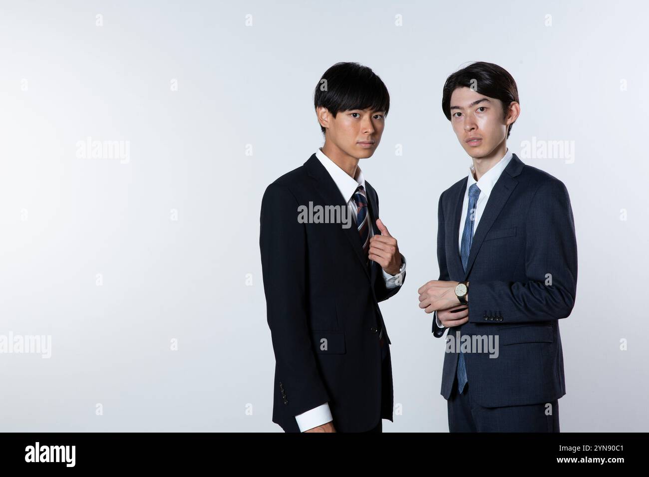 Two man in black suits hi-res stock photography and images - Alamy