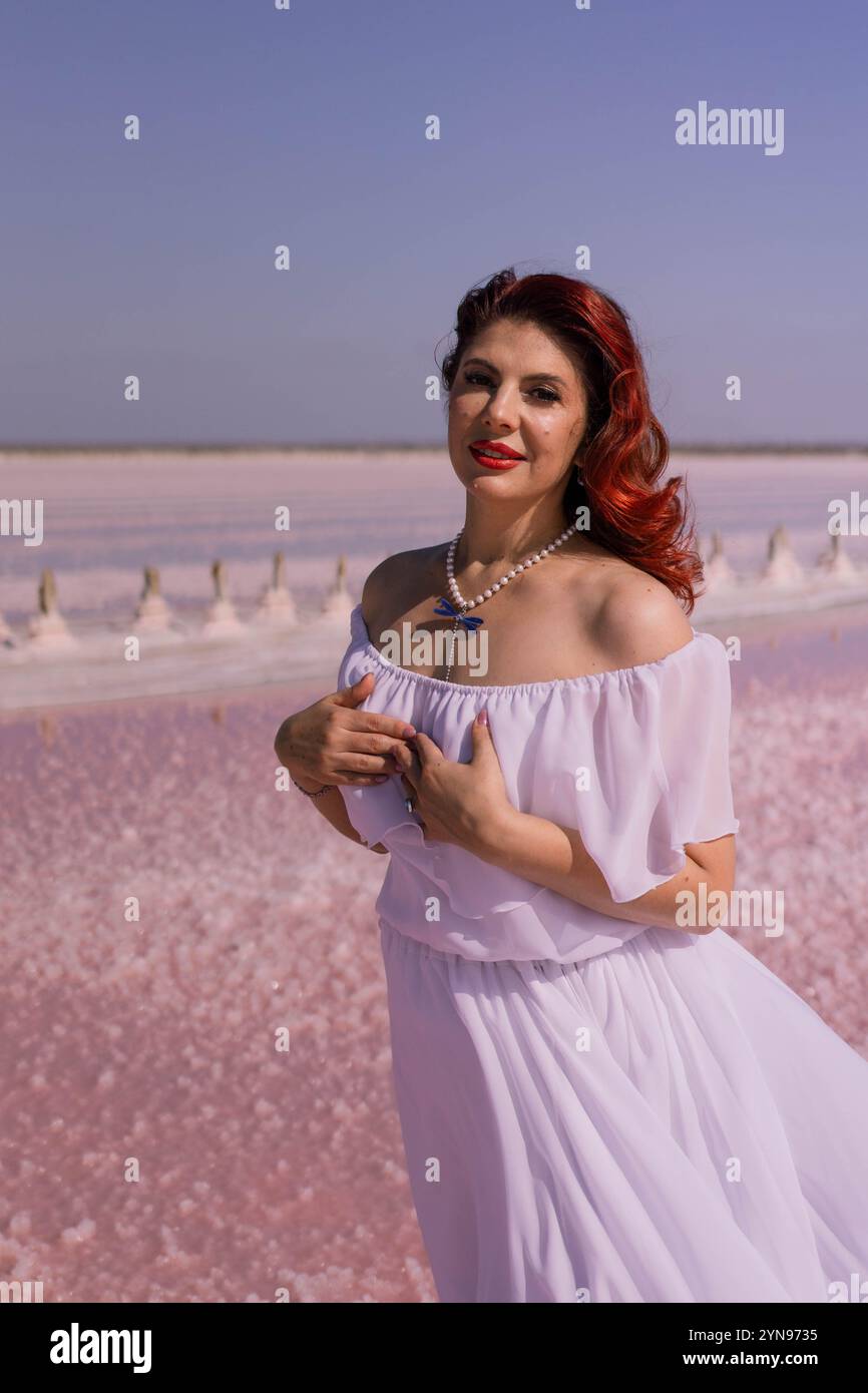 Woman White Dress Pink Salt Lake Smiling at Camera Stock Photo - Alamy