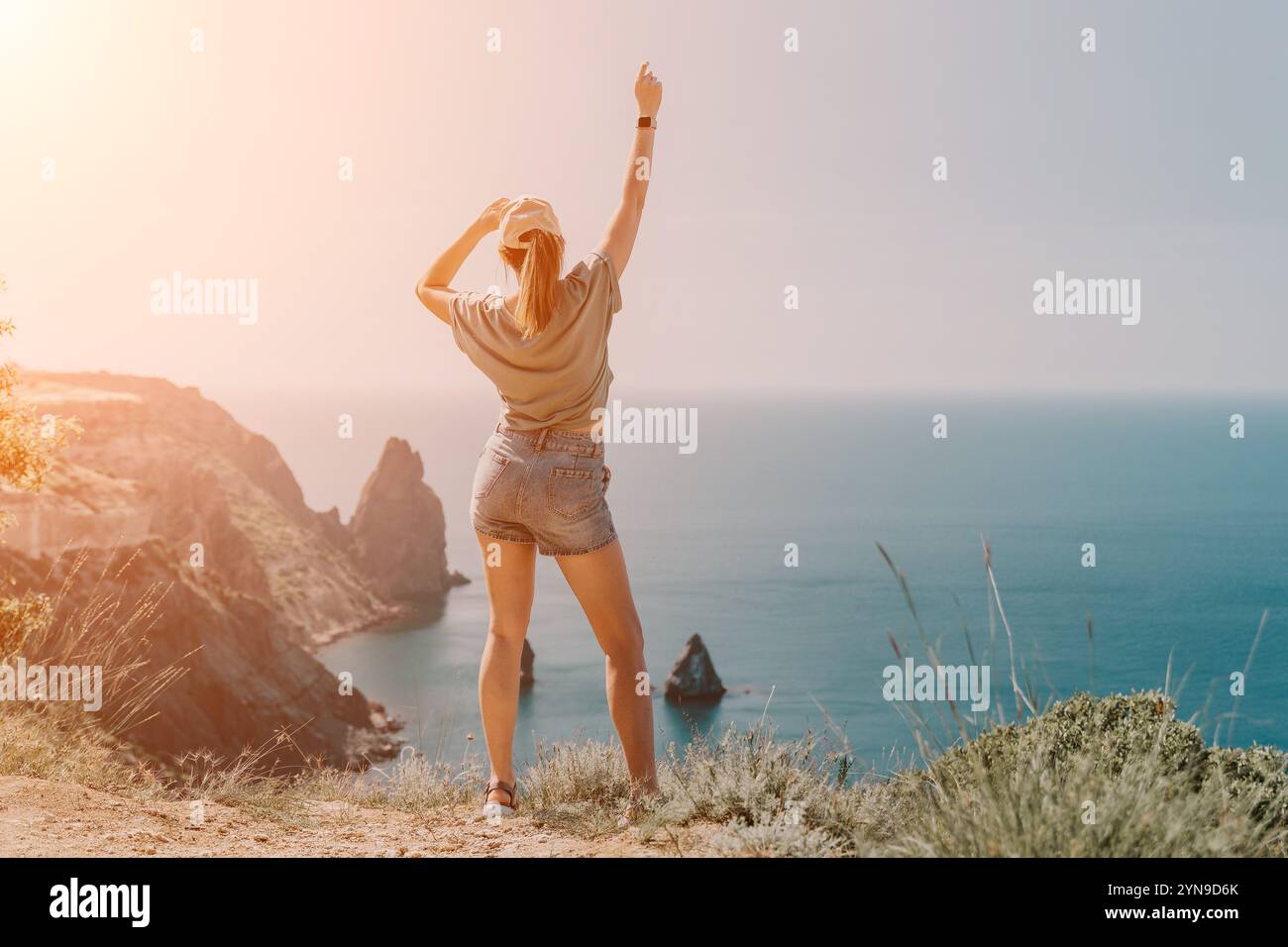 Woman enjoying breathtaking coastal hi-res stock photography and images ...