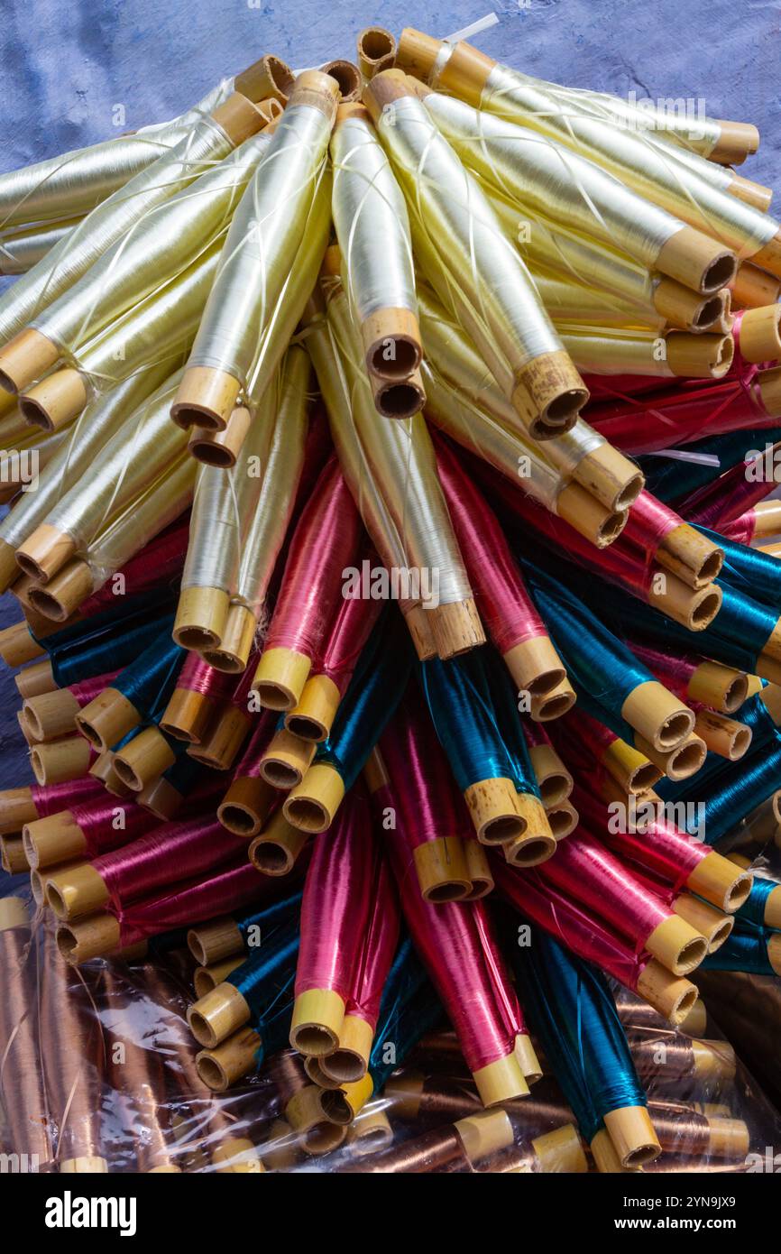 Background. Close up. Decorative, multicolored moroccan threads.  Variety of colors of silk threads for sewing. Stock Photo