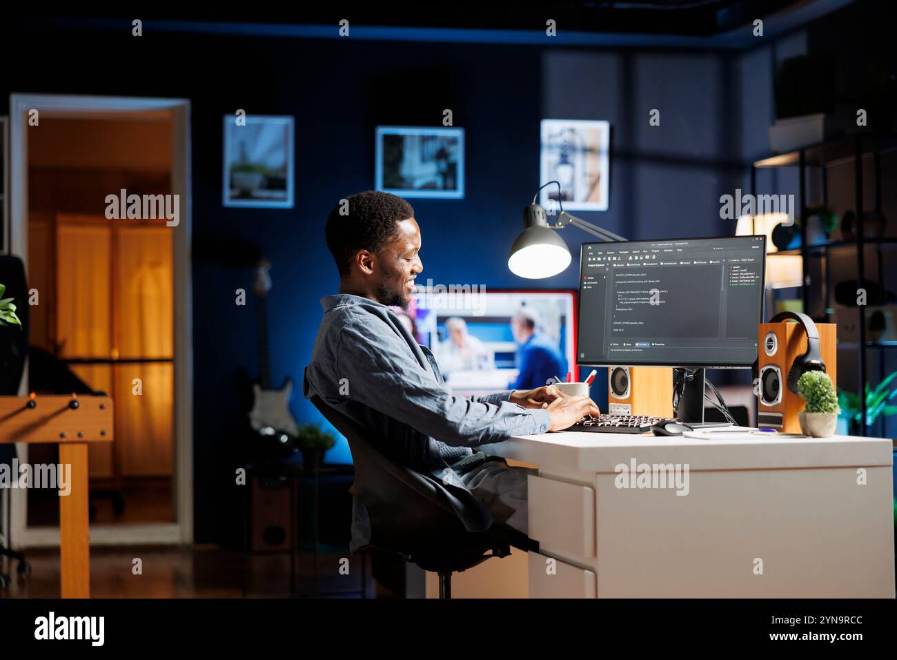 Specialist working program coding in hi-res stock photography and ...