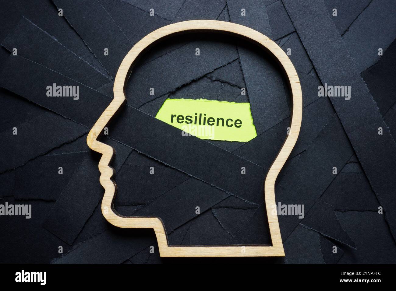 Black stripes and the word resilience. Overcoming challenges Stock ...