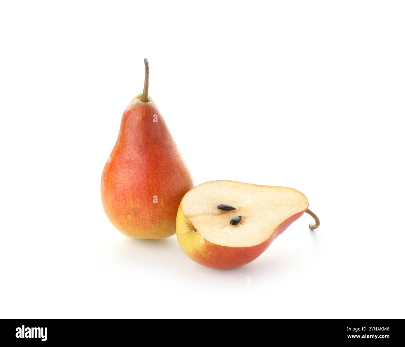 Whole and cut ripe pears isolated on white Stock Photo - Alamy