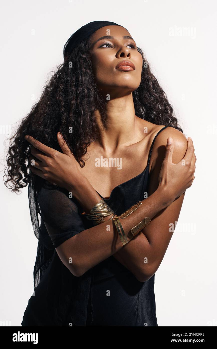 Arms around herself hi-res stock photography and images - Alamy