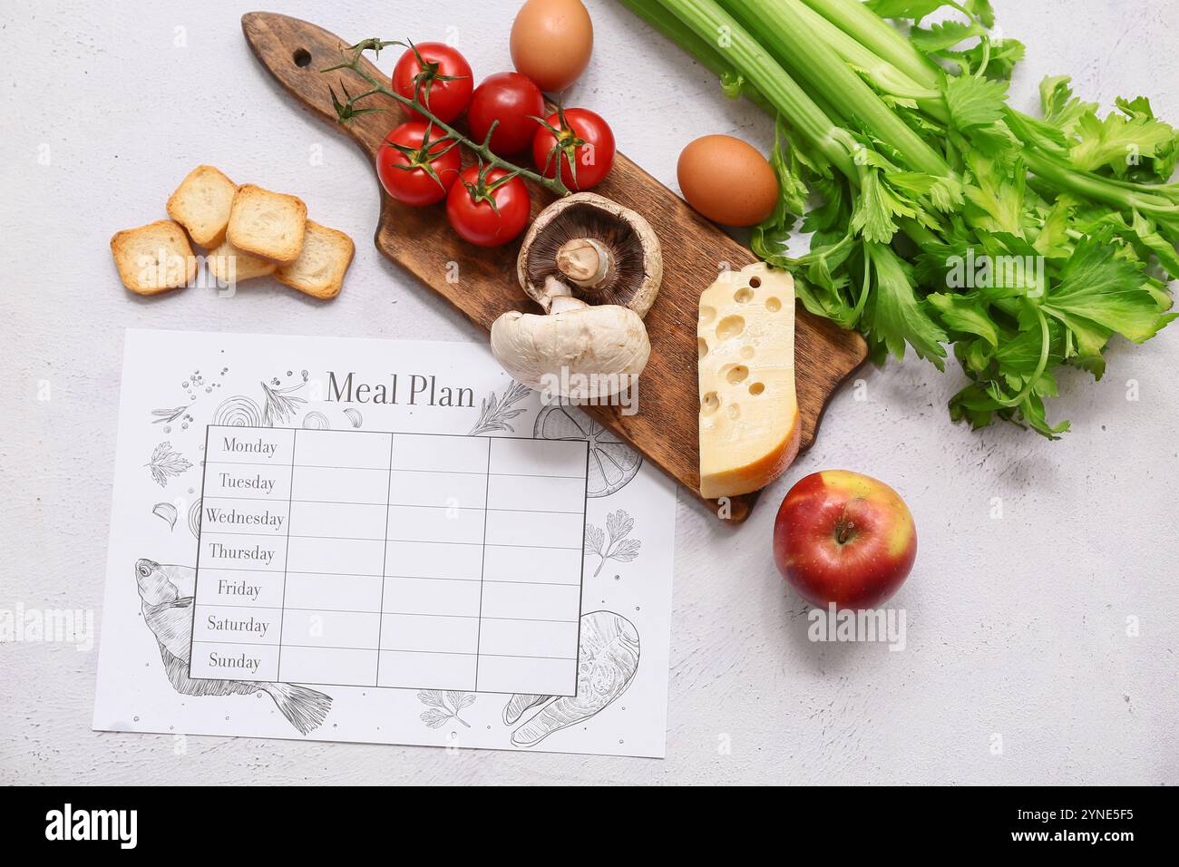Healthy products and weekly meal plan on light background. Diet concept ...