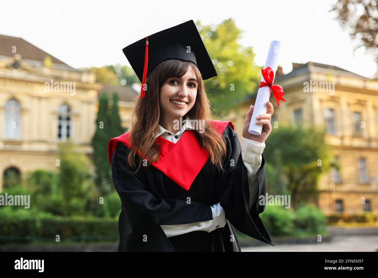 After Graduation Image Happy student with diploma after graduation ceremony outdoors Stock ...