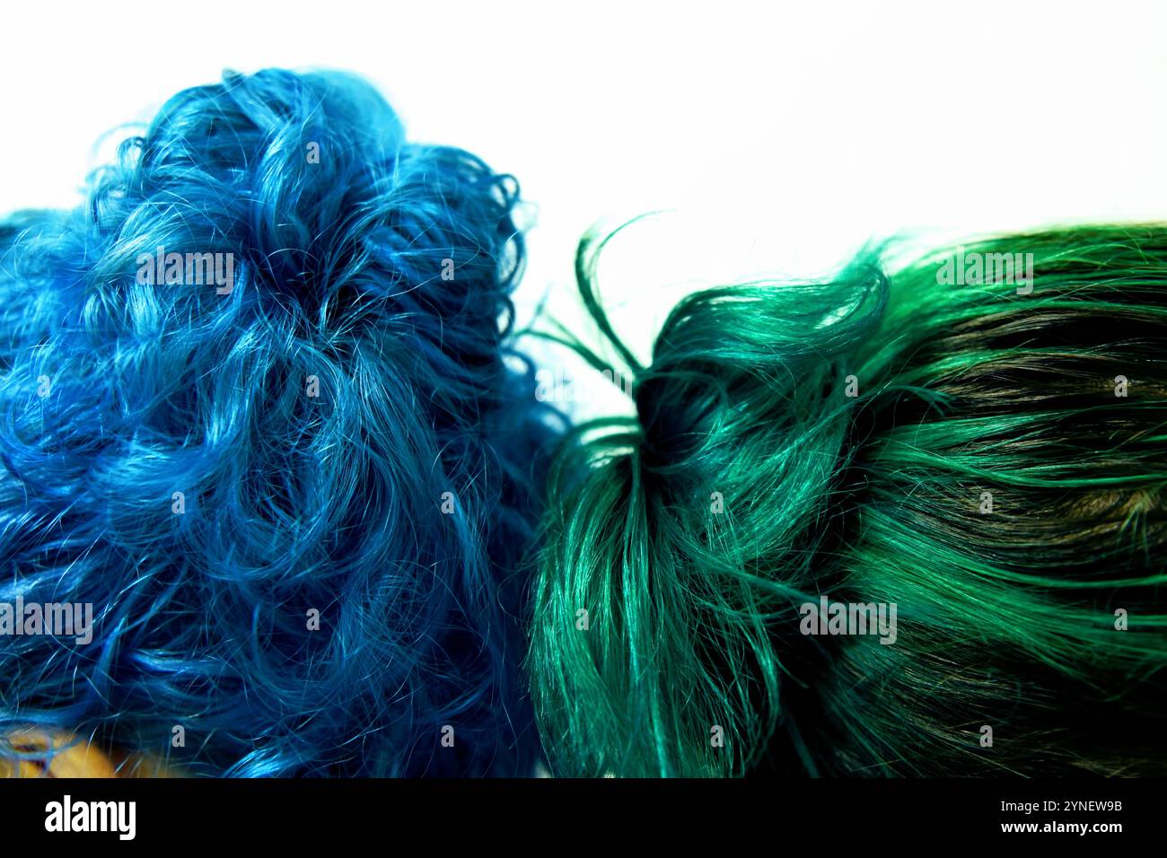 Details and textures of the colored hair of two young women standing ...