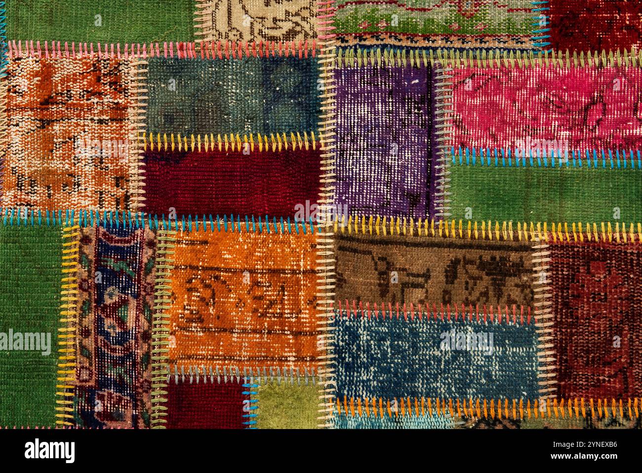 Colorful Patchwork Textile with Stitching Detail Stock Photo
