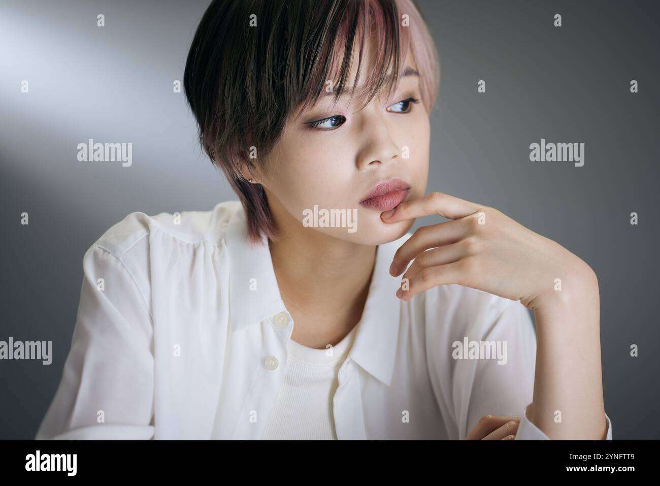 Japanese woman with a white shirt Stock Photo - Alamy
