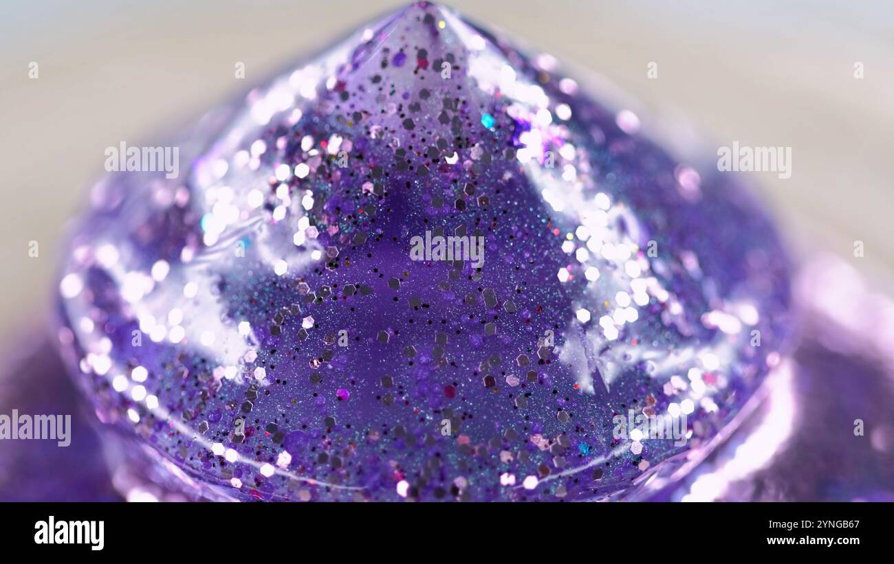 Wet glitter texture. Shiny fluid drip. Blur purple color sequin stars ...