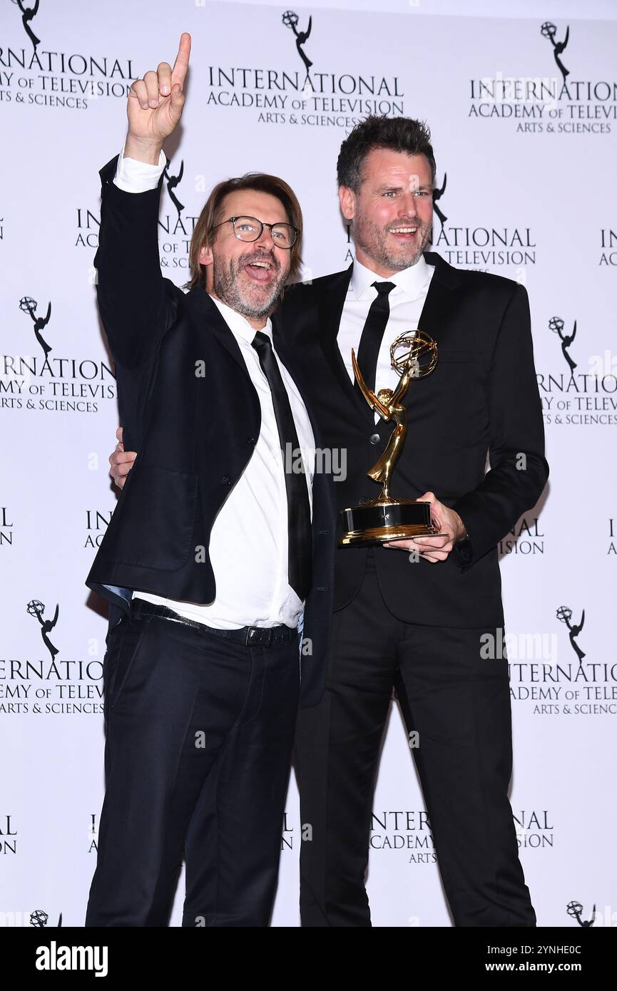 New York, USA. 25th Nov, 2024. Executive producers Maarten Millen (R) and Olivier Goris pose in the press room with their Emmy for Best Non-Scripted Entertainment for Belgian show 'Restaurant Misverstand' Season 2, during the 52nd International Emmy Awards at the New York Hilton, New York, NY, November 25, 2024. (Photo by Anthony Behar/Sipa USA) Credit: Sipa USA/Alamy Live News Stock Photo