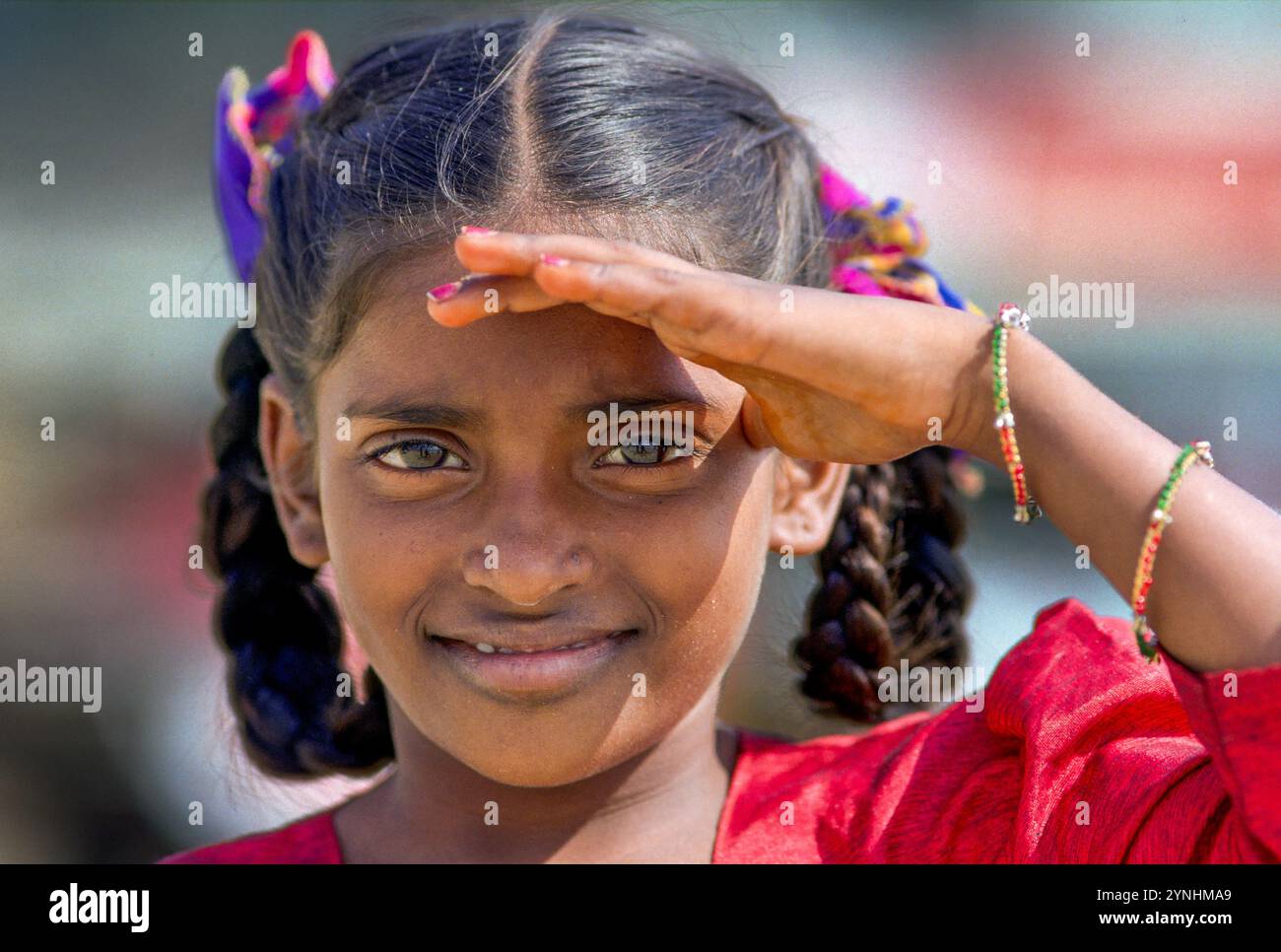 India, Madras/Chennai, school girl on her way to school. Stock Photo
