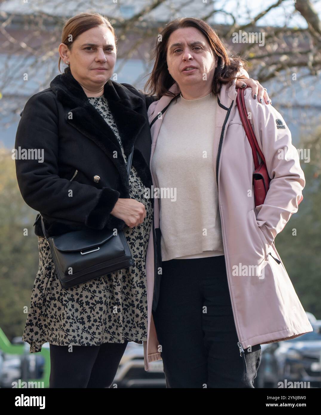 Darron Coster's widow Alison Coster (right) and Darron Coster's sister in law Tracy Norlund (left), outside Bradford Crown Court, after Jacqueline Higson received a suspended prison sentence after pleaded guilty to causing the death of a motorcyclist, Darron Coster, who was hailed as a hero following the Manchester Arena bombing. Higson has pleaded guilty to one charge of causing the death of 54-year-old Mr Coster by careless driving following a collision between her car and his bike near Skipton, in North Yorkshire, in July 2021. Picture date: Tuesday November 26, 2024. Stock Photo