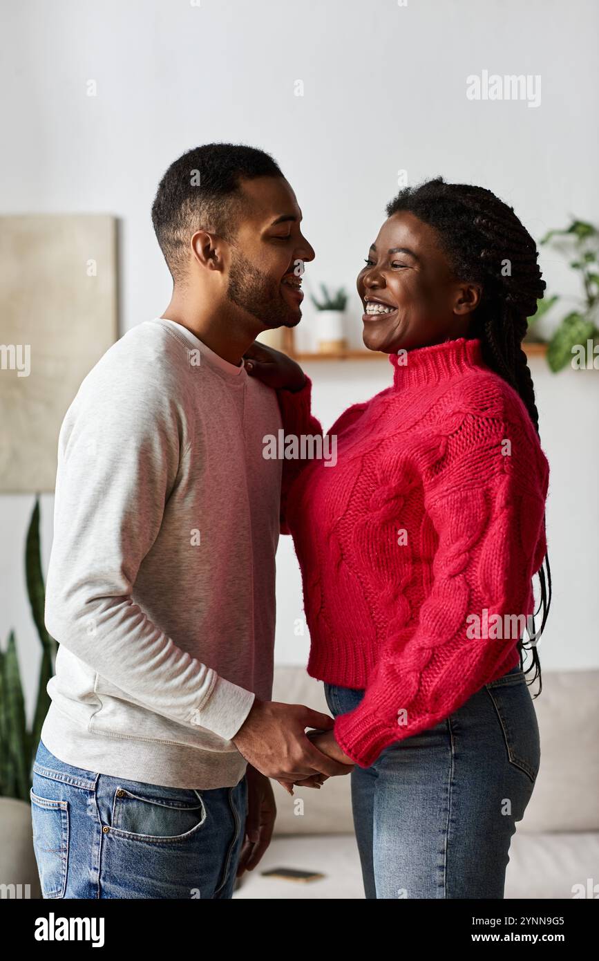 Joyful couple shares quality hi-res stock photography and images - Alamy