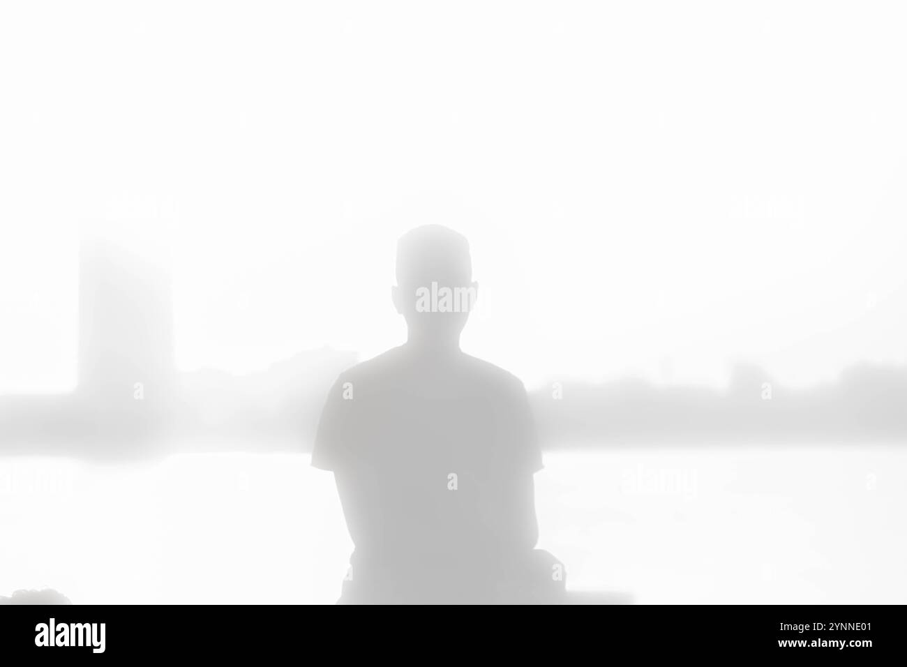 Sad boy sitting alone in hi-res stock photography and images - Alamy