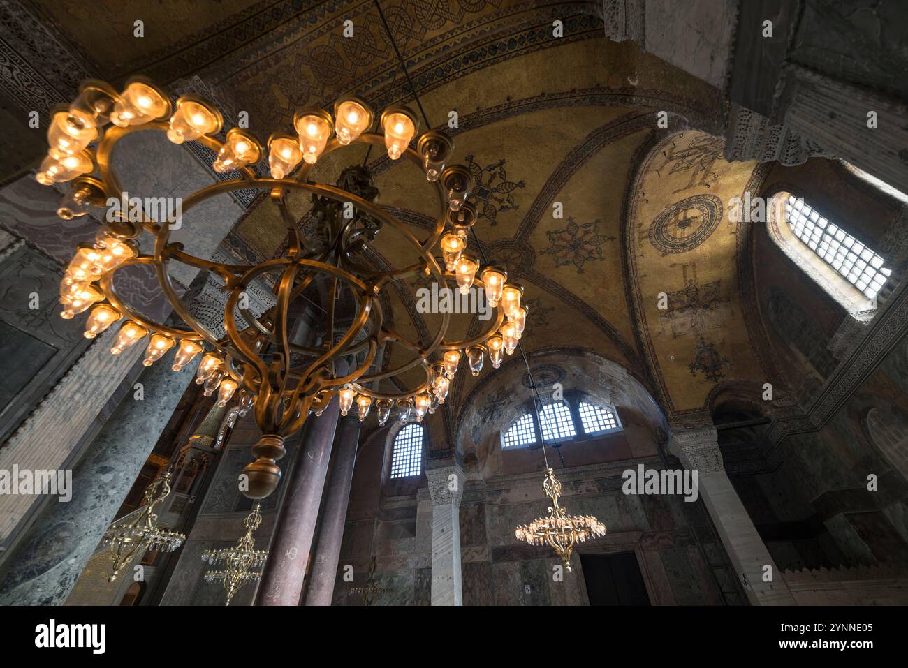 Old Chandeliers in Hagia Sophia,a mosque and former church serving as a major cultural and historical site in Istanbul, Turkey. Stock Photo