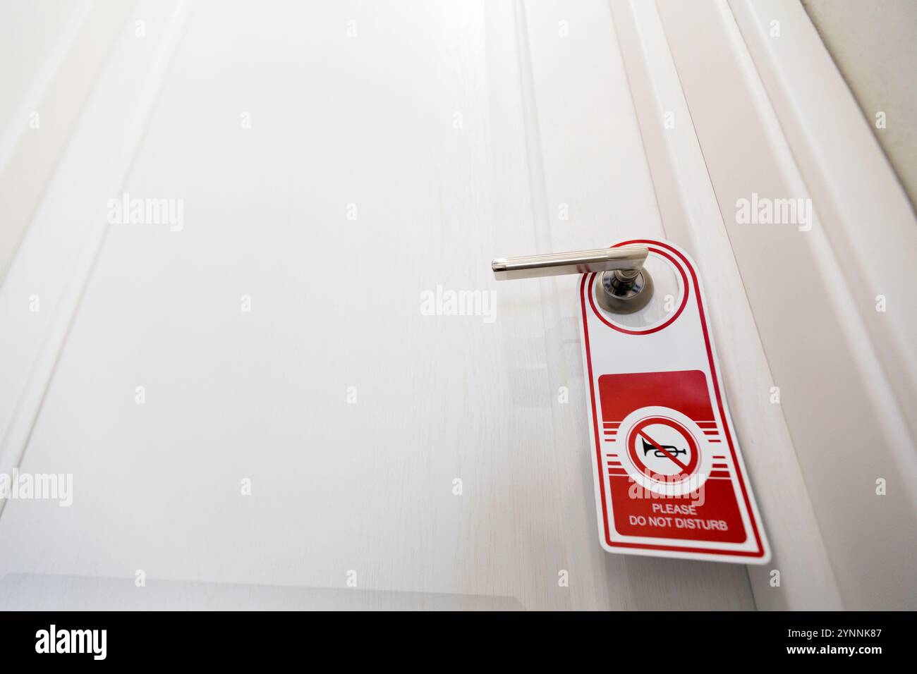 Red door white hotel sign hi-res stock photography and images - Alamy