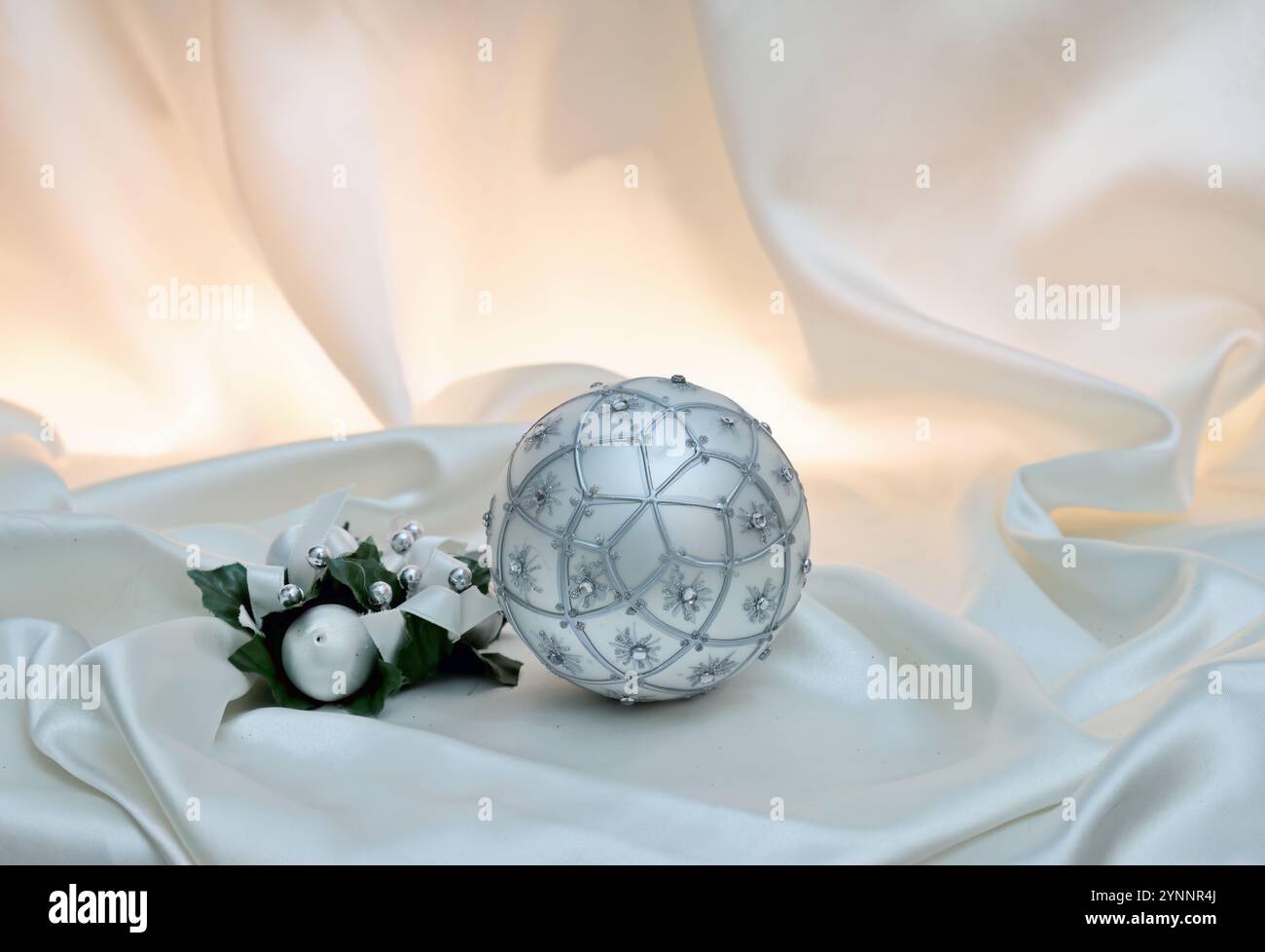 Silver colored christmas decoration on the table Stock Photo