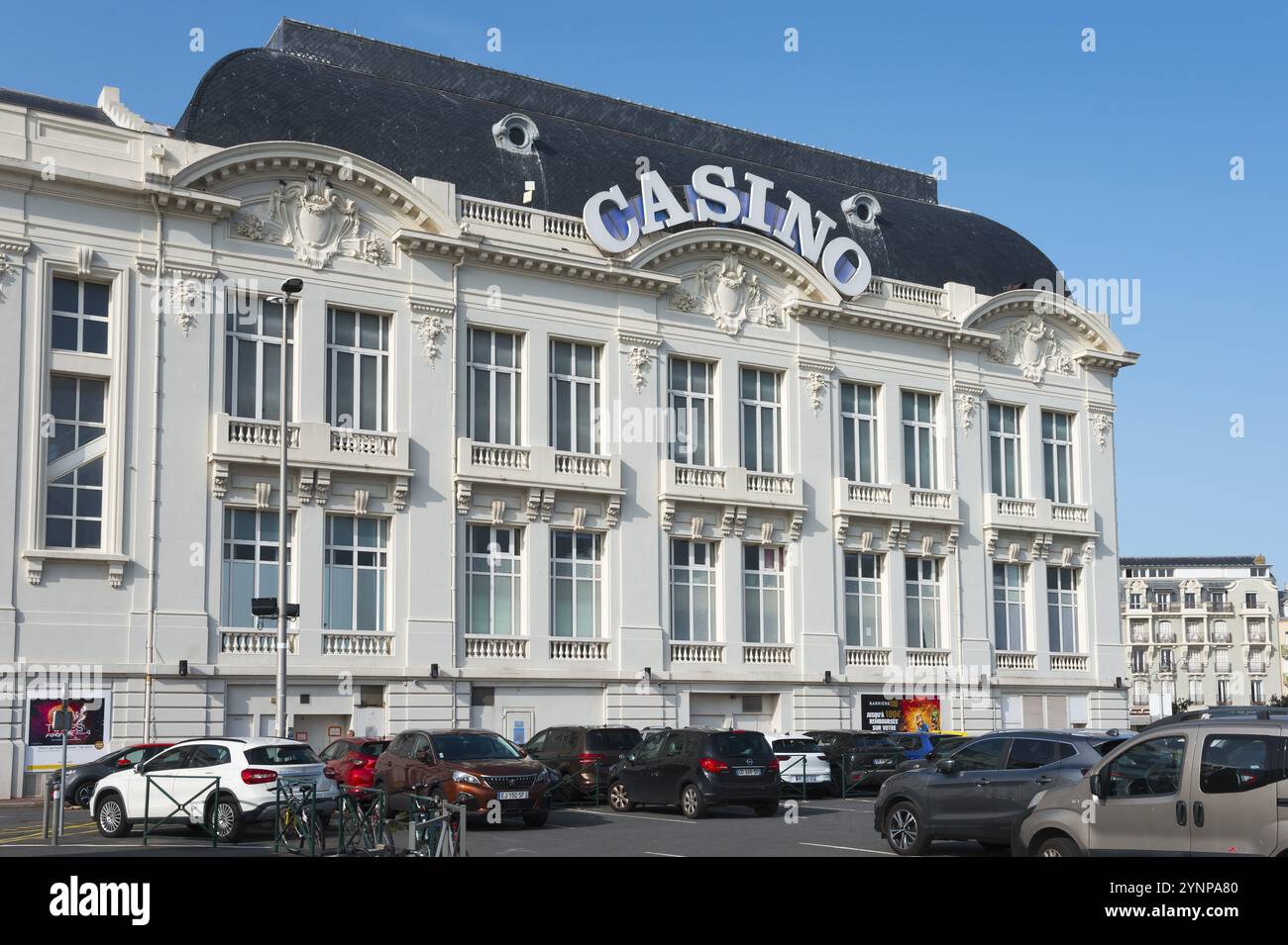 Historic building in classical style with the lettering Casino and parked cars in front of it, Casino Barriere, Casino, Trouville-sur-Mer, Trouville Stock Photo