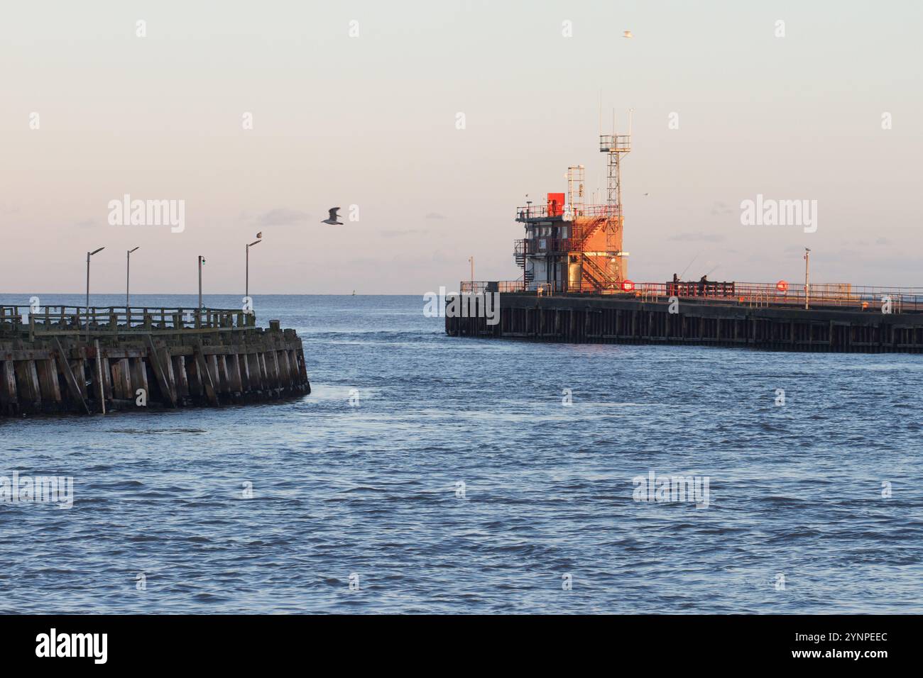Great Yarmouth harbour in evening light, yare river mouth, light shine ...