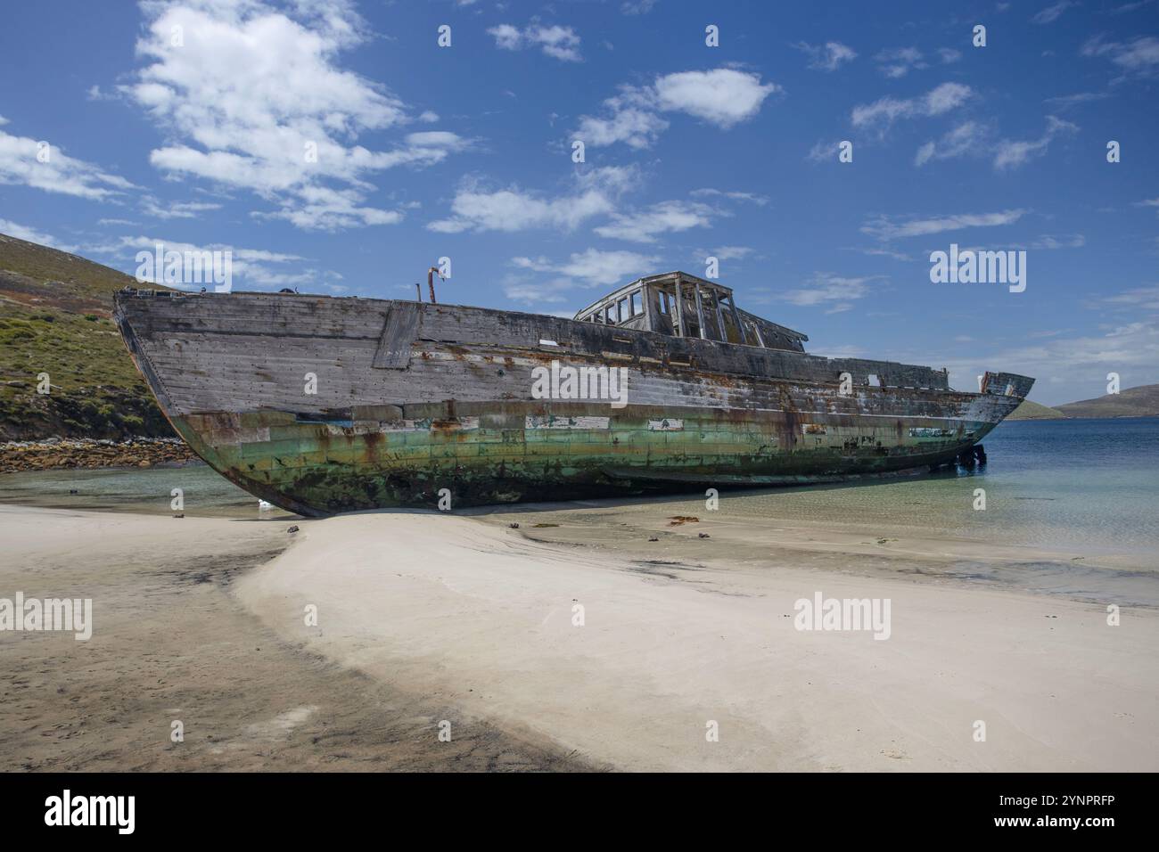 Wreck of HMCS Protector III on a beach at the settlement at New Island, Falkland Islands. Stock Photo