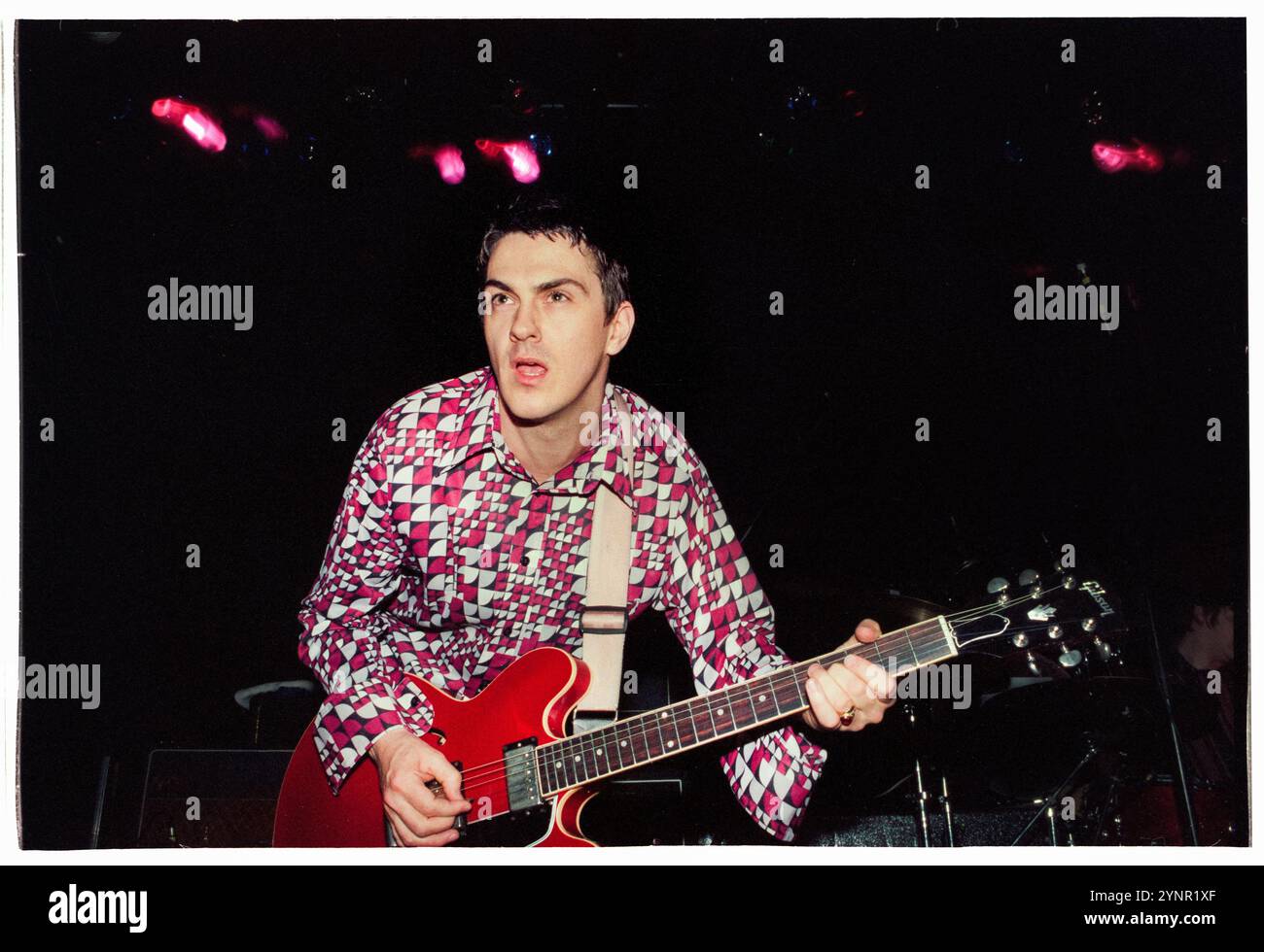 60 FT DOLLS, CONCERT, 1997: Richard J Parfitt of the band 60Ft Dolls playing at Cardiff University in Cardiff, Wales, UK on 10 June 1997. Photo: Rob Watkins. INFO: 60 Ft Dolls, a Welsh alternative rock band of the '90s, blended punk, rock, and pop influences. With their dynamic sound and spirited performances, they gained attention with the album 'The Big 3' before disbanding, leaving a mark on the vibrant Britpop era. Stock Photo