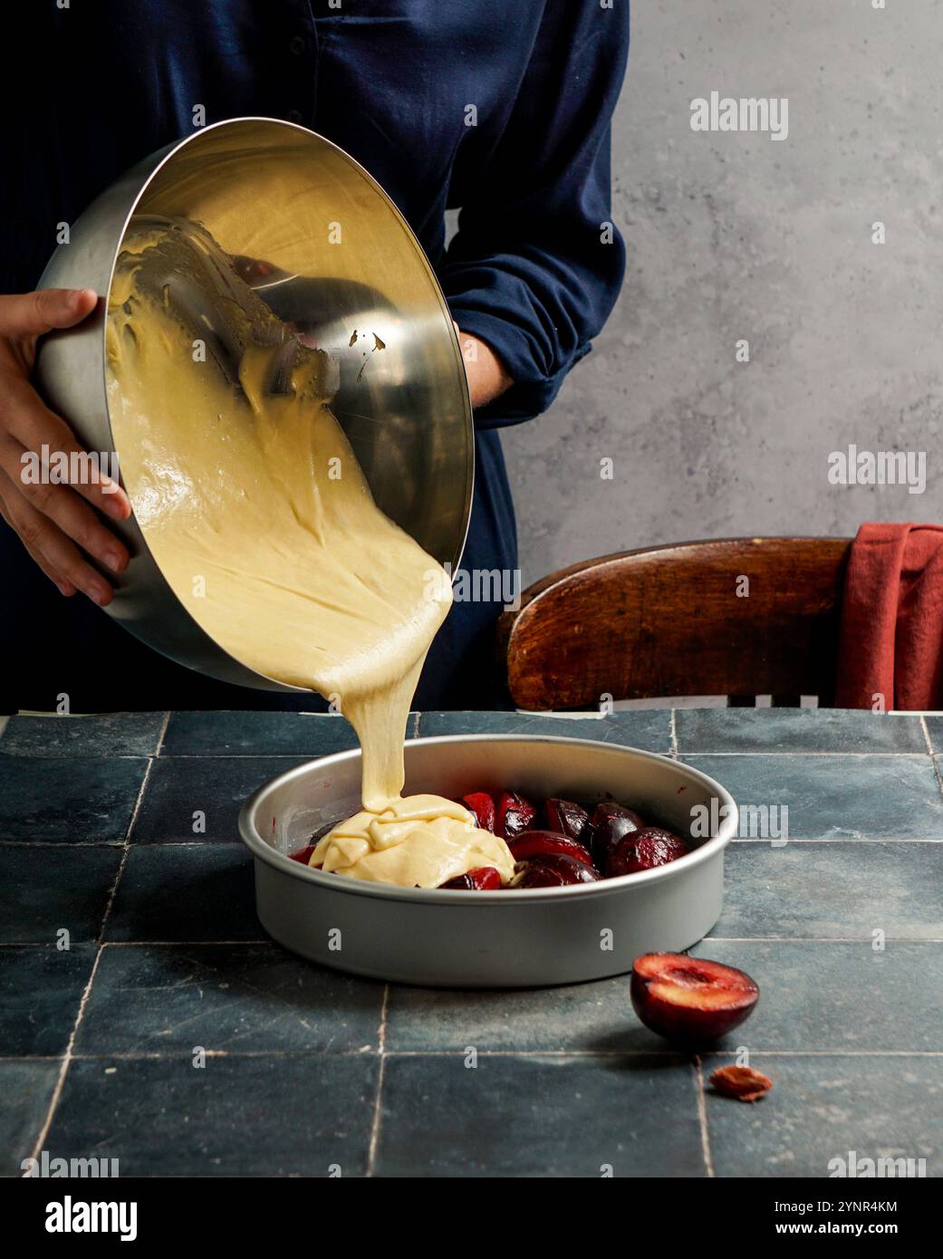 Plum tarte tatin before baking, red plums Stock Photo