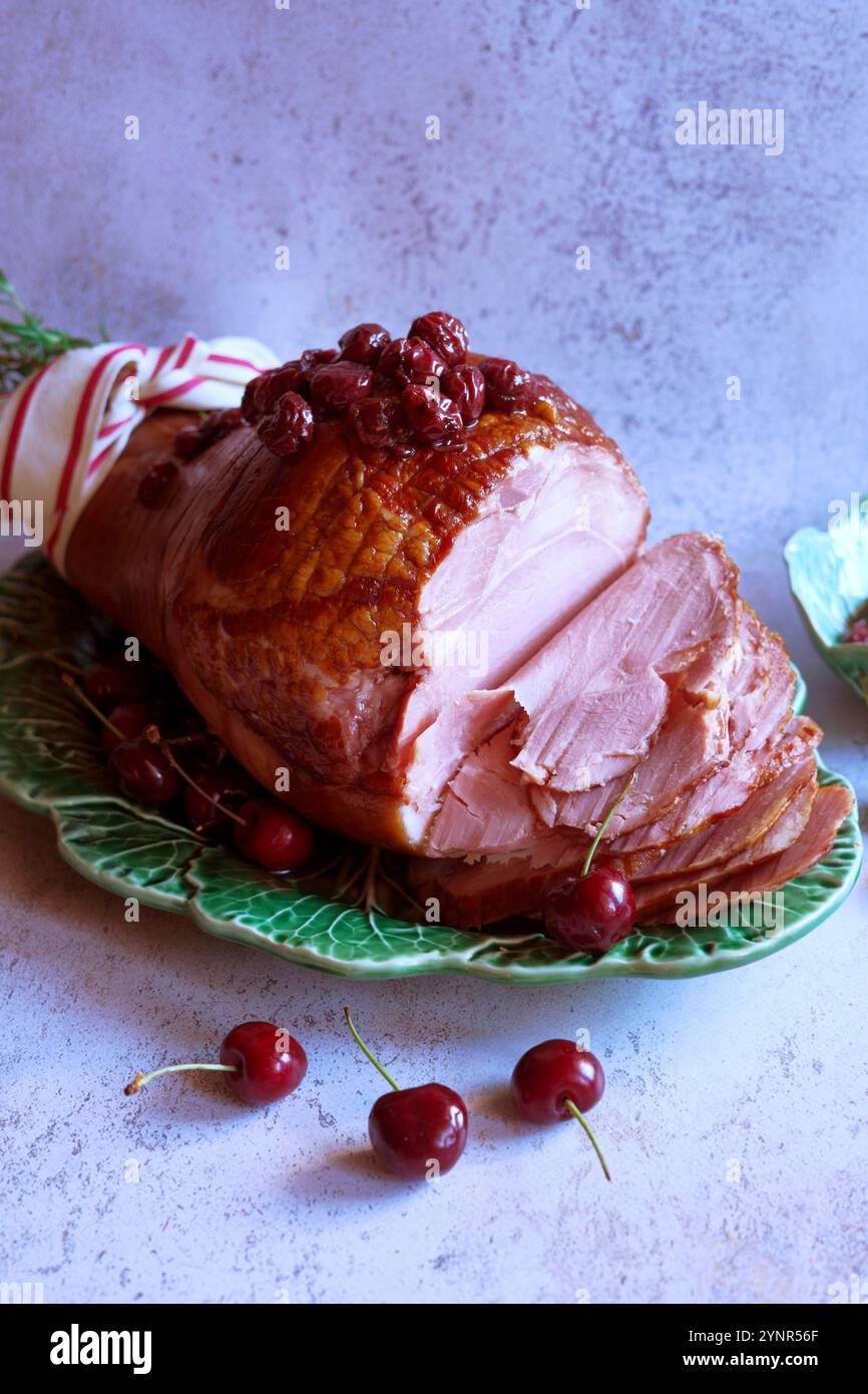 Baked Ham with Cherry and Maple Syrup Glaze. Stock Photo