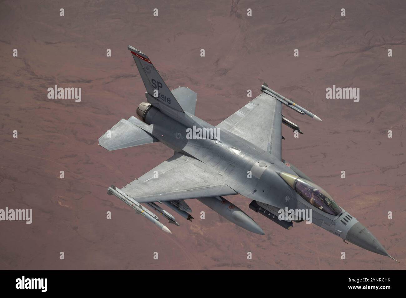 A U.S. Air Force F-16 Fighting Falcon flies over the U.S. Central ...
