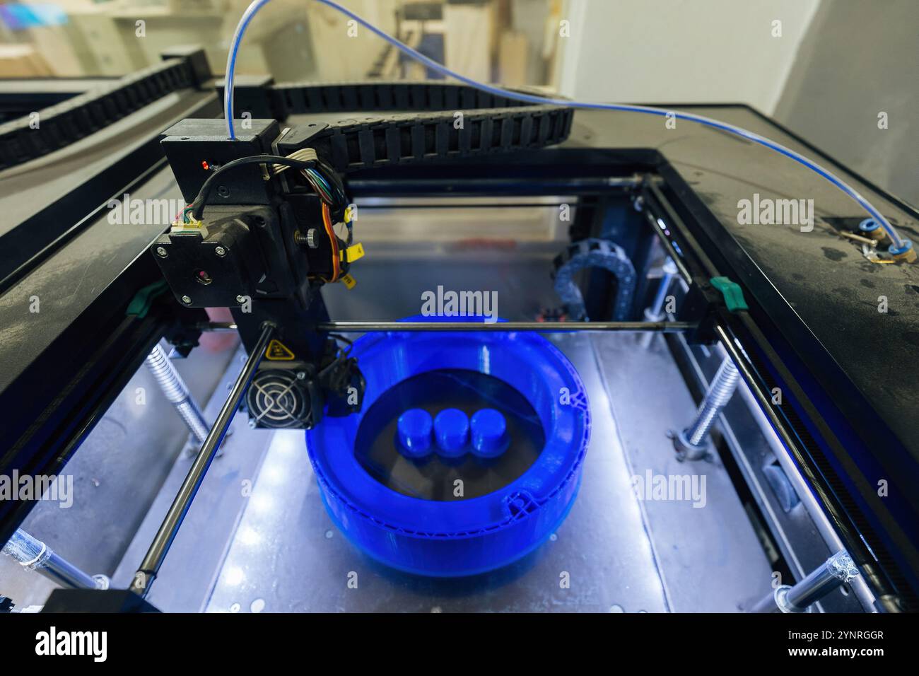 3D printing process of plastic machine part. Stock Photo