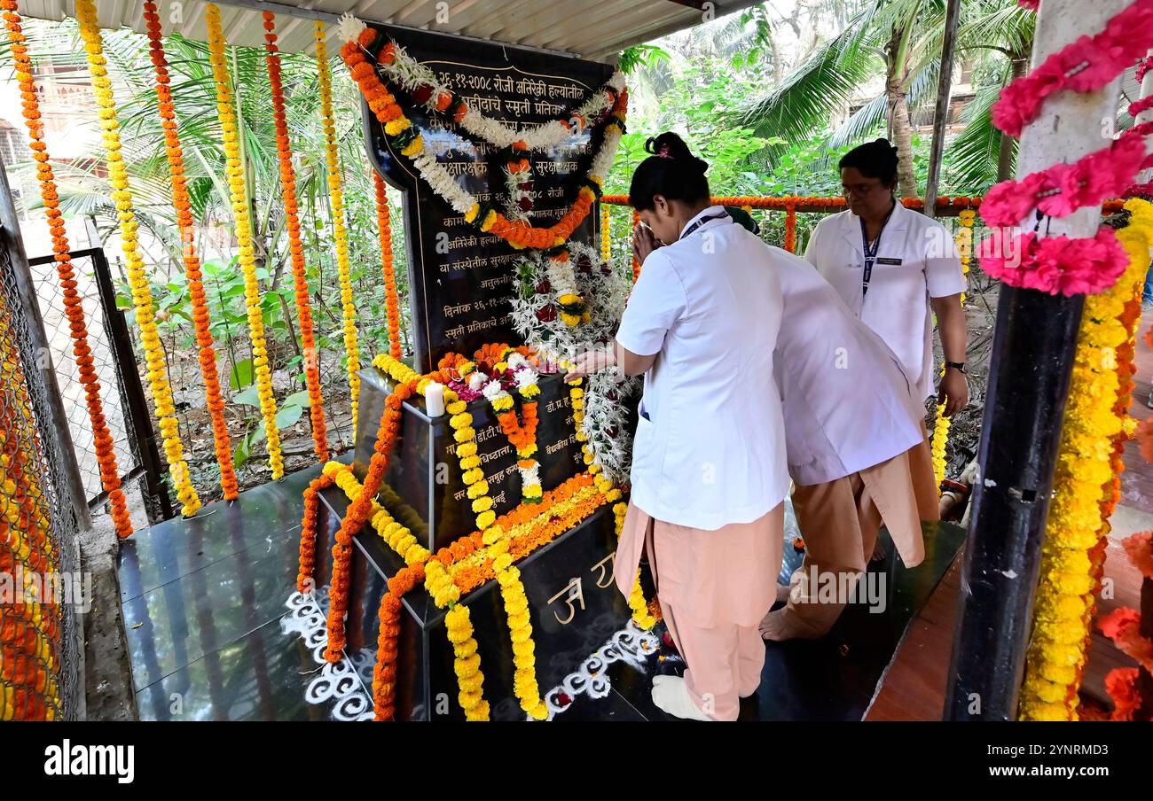 MUMBAI, INDIA - NOVEMBER 26: Staff Nurse CAMA Hospital pay homage to ...
