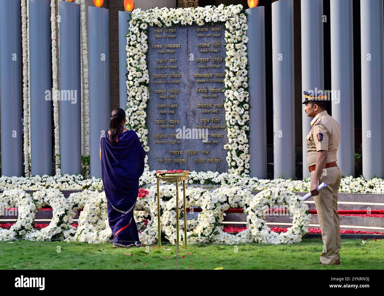 MUMBAI, INDIA - NOVEMBER 26: Relatives of Mumbai Police Martyrs pay ...