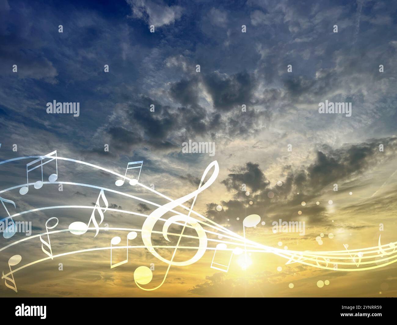 Musical symbols in beautiful sunset sky with clouds Stock Photo - Alamy