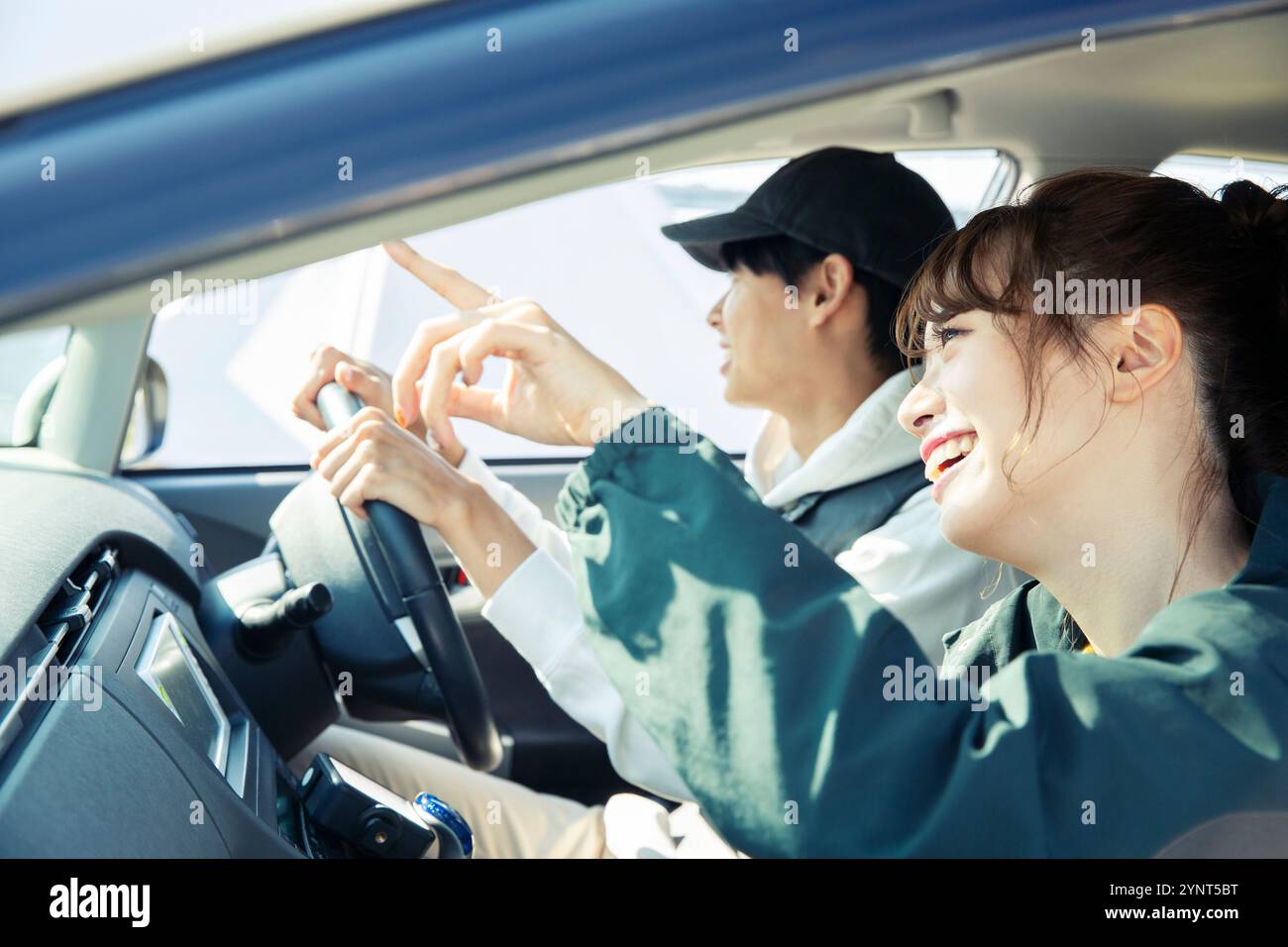 Couple in their 20s enjoying a drive Stock Photo - Alamy