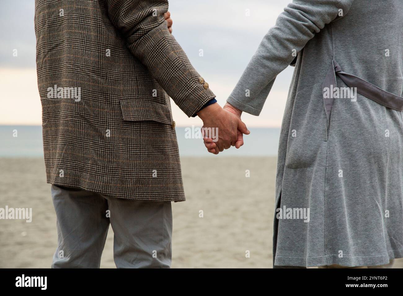 Holding hands walk date hi-res stock photography and images - Alamy