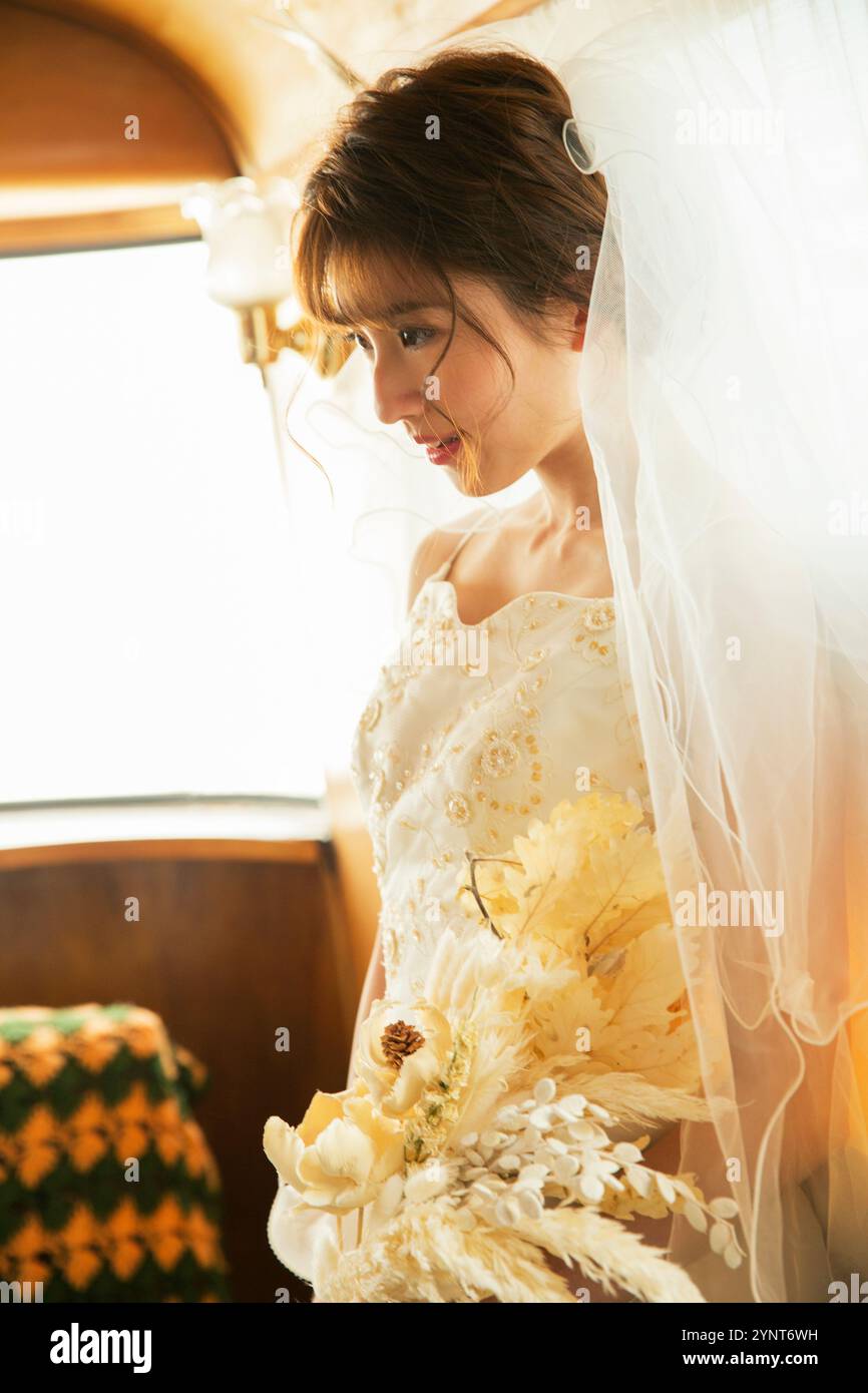 Bride and groom in trailer Stock Photo - Alamy