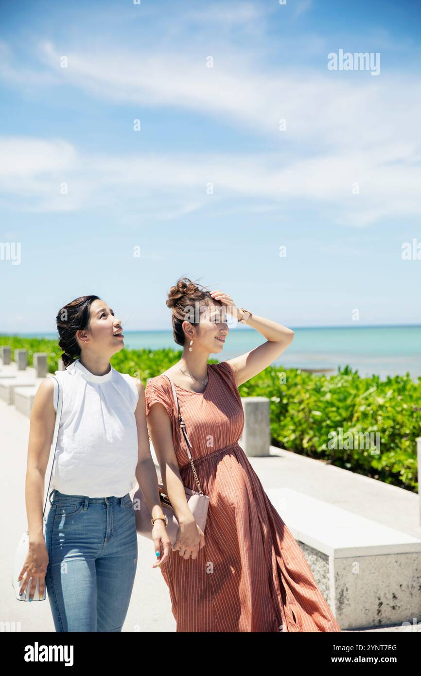 Two women in their 20s enjoying their trip Stock Photo - Alamy